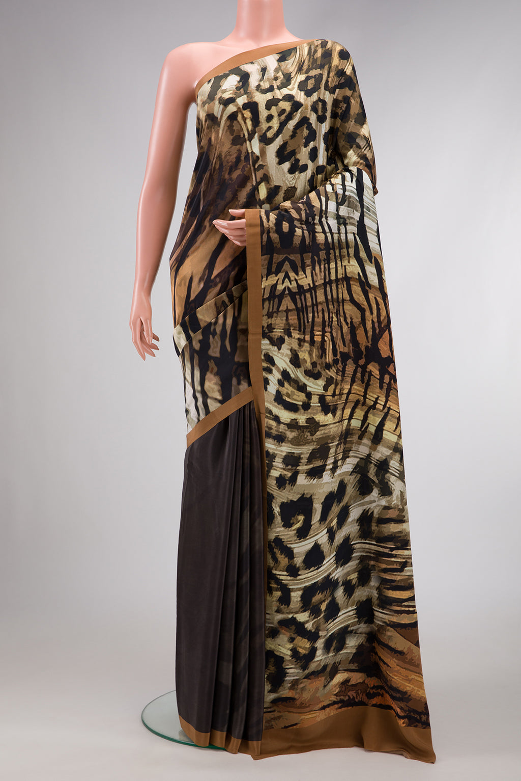 Black Dual Tone Mysore Crepe Saree with Printed design on the body and Plain Border.  displayed on a mannequin