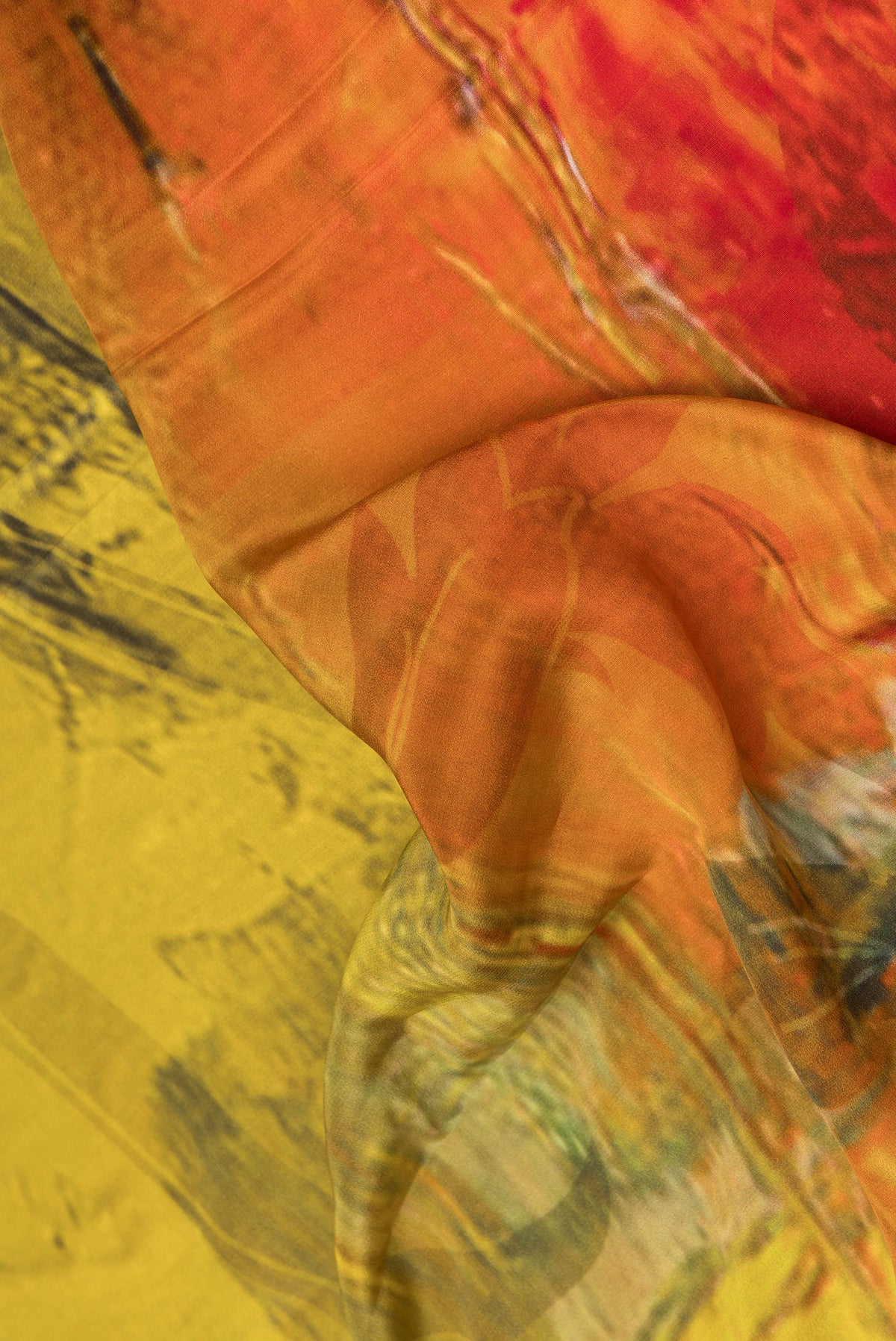 Close up of Multi Color Crepe Saree with Printed design on the body and Plain Border.  displaying folds
