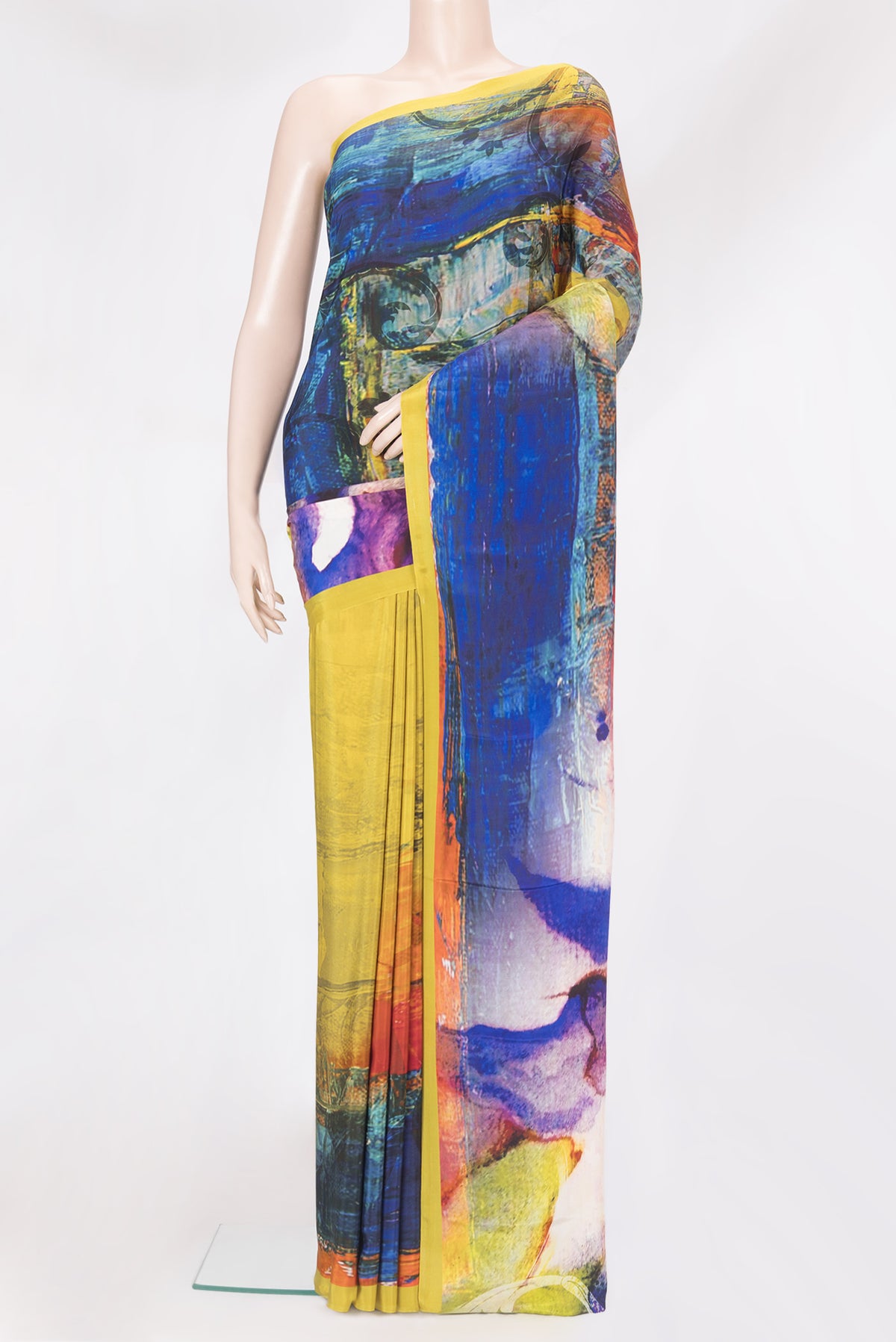 Multi Color Crepe Saree with Printed design on the body and Plain Border.  displayed on a mannequin