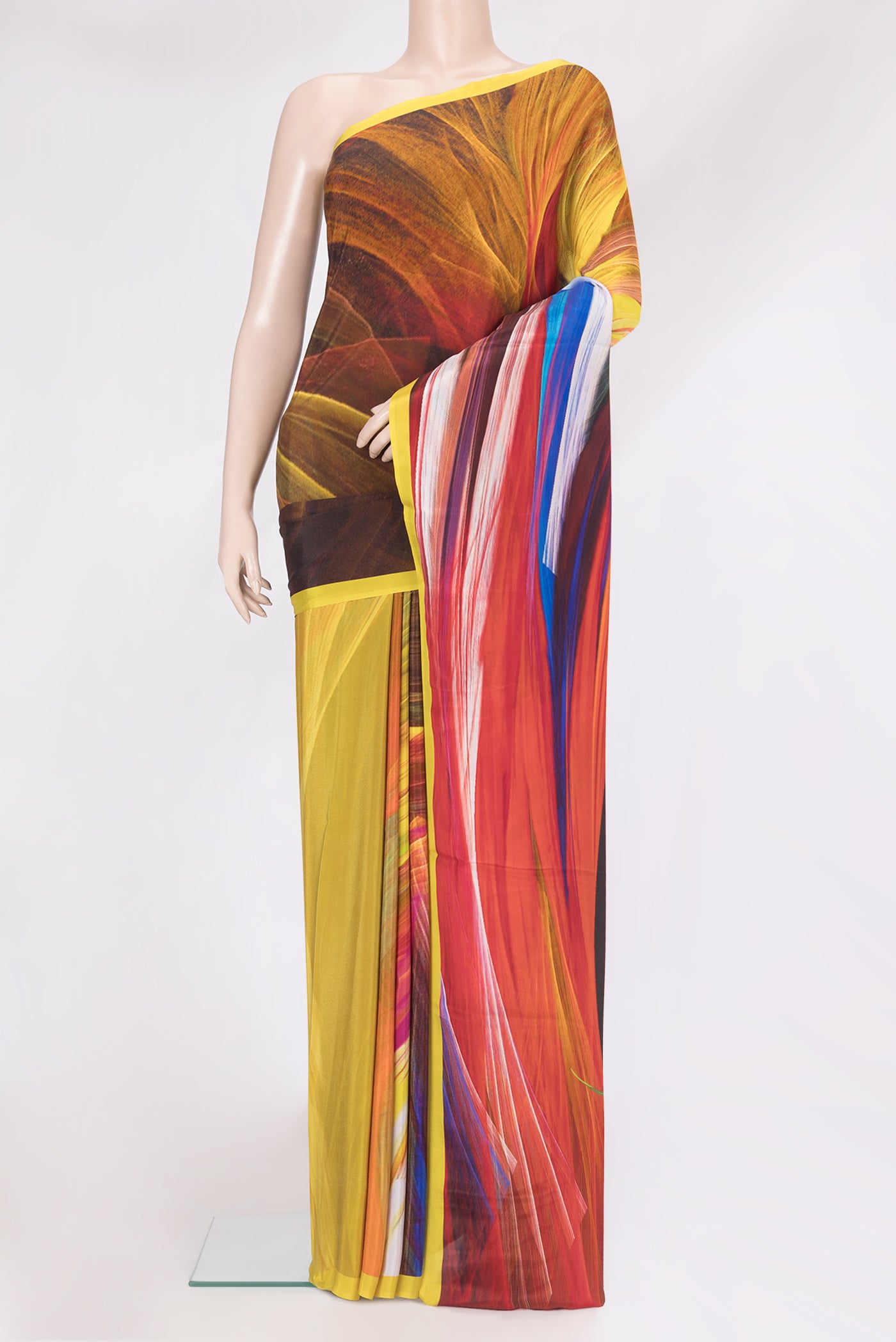 Multi Color Crepe Saree with Printed design on the body and Plain Border.  displayed on a mannequin