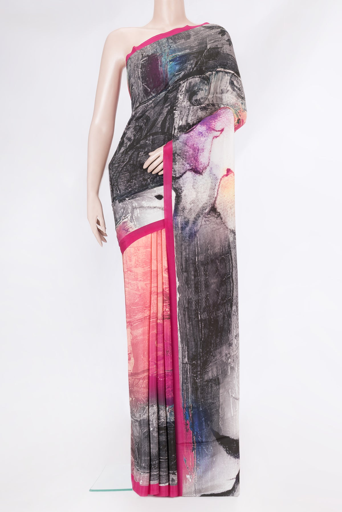 Grey Dual Tone Mysore Crepe Saree with Printed design on the body and Plain Border.  displayed on a mannequin