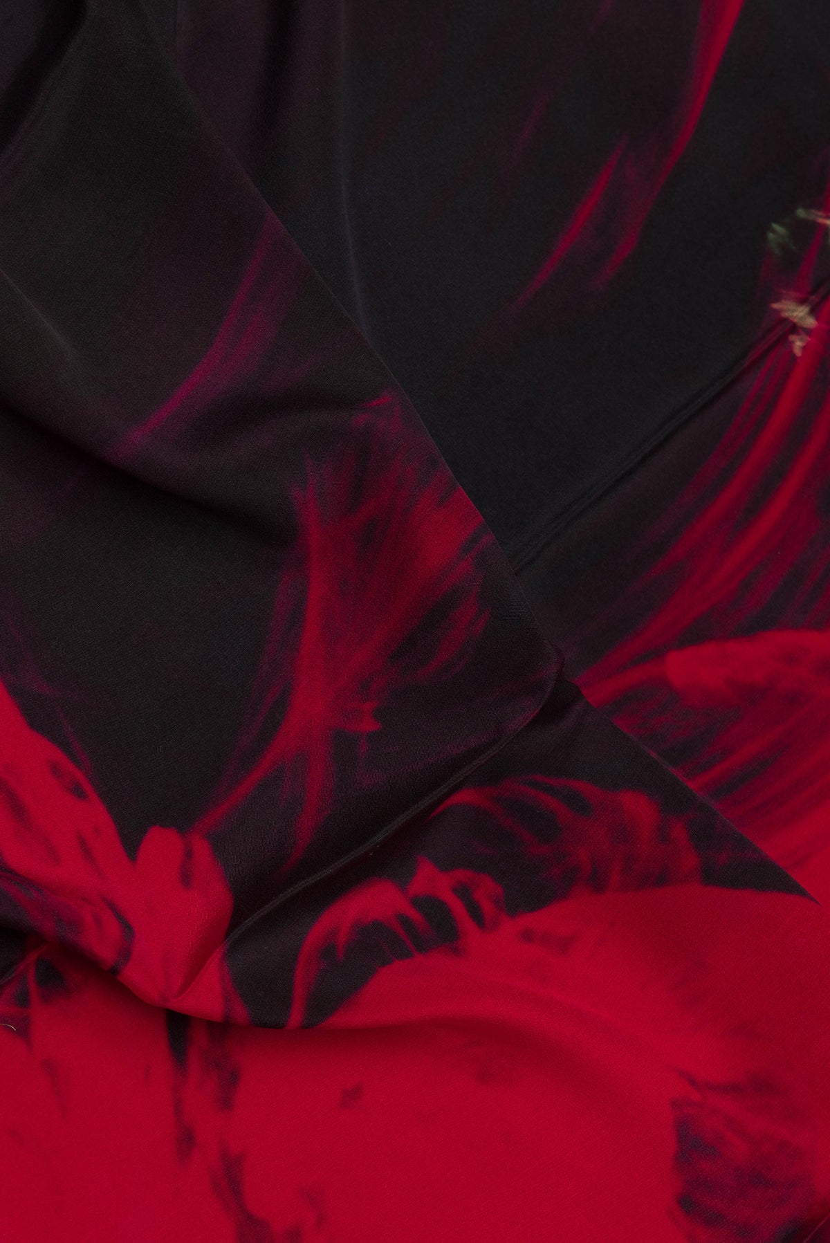 Close up of Multi Color Crepe Saree with Printed design on the body and Plain Border.  displaying folds