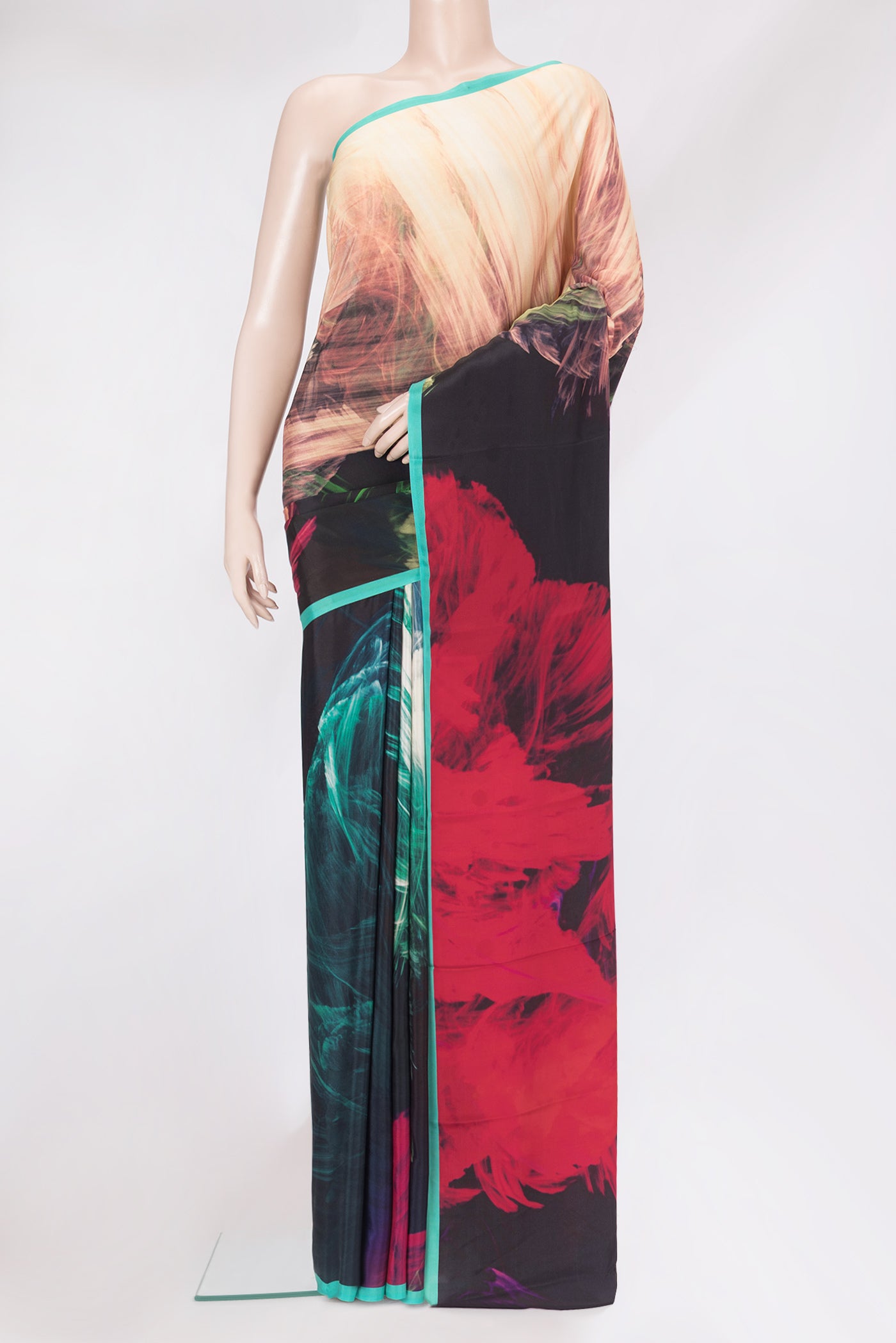 Multi Color Crepe Saree with Printed design on the body and Plain Border.  displayed on a mannequin