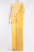 Yellow Chiffon Saree with Embroidery on the body and Zari Border.  displayed on a mannequin