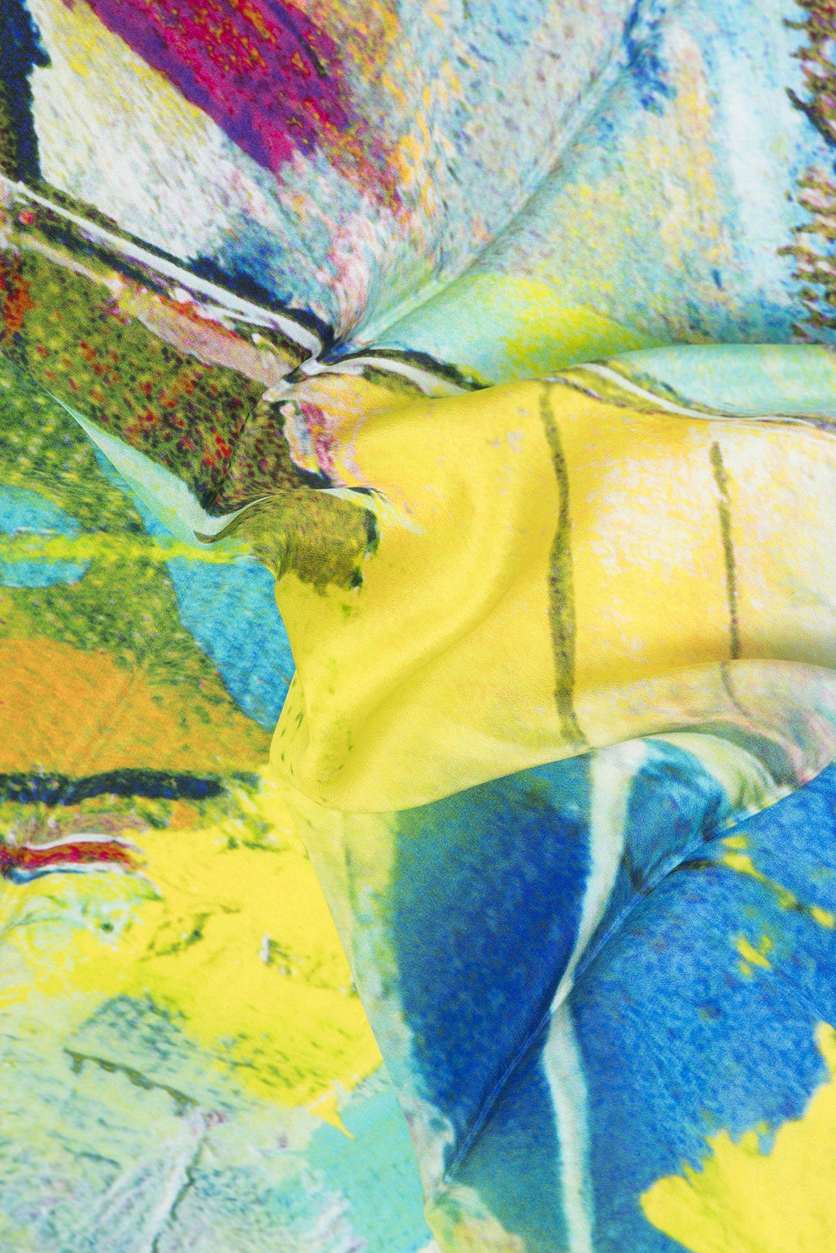Close up of Multi Color Crepe Saree with Printed design on the body and Plain Border.  displaying folds