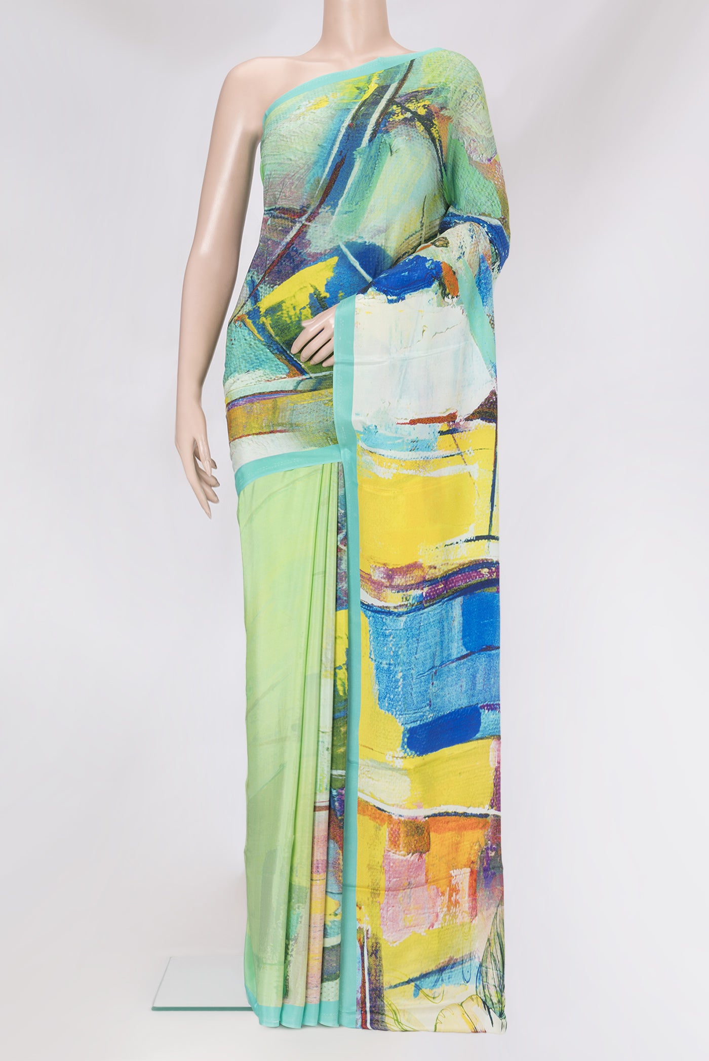 Multi Color Crepe Saree with Printed design on the body and Plain Border.  displayed on a mannequin