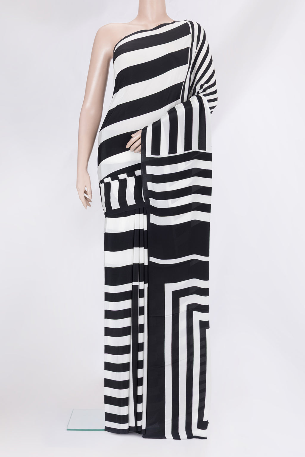 Multi Color Crepe Saree with Printed design on the body and Plain Border.  displayed on a mannequin