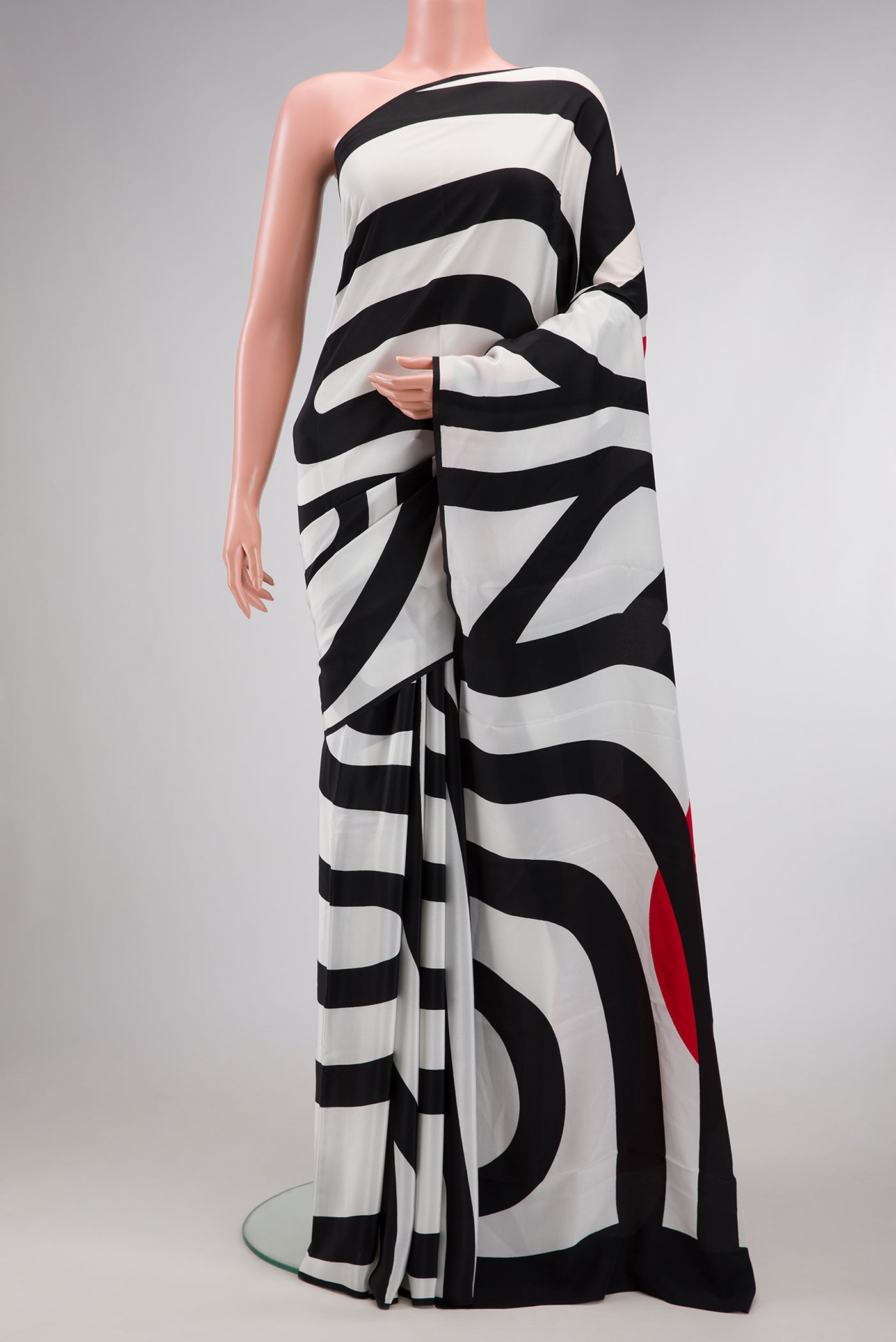 Off White Dual Tone Mysore Crepe Saree with Printed design on the body and Without Border.  displayed on a mannequin