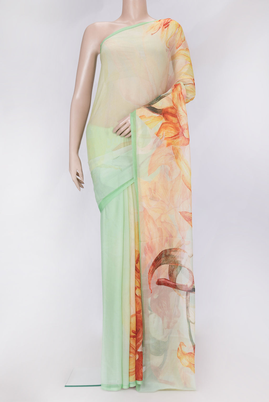 Pista Green Dual Tone Mysore Chiffon Saree with Printed design on the body and Without Border.  displayed on a mannequin