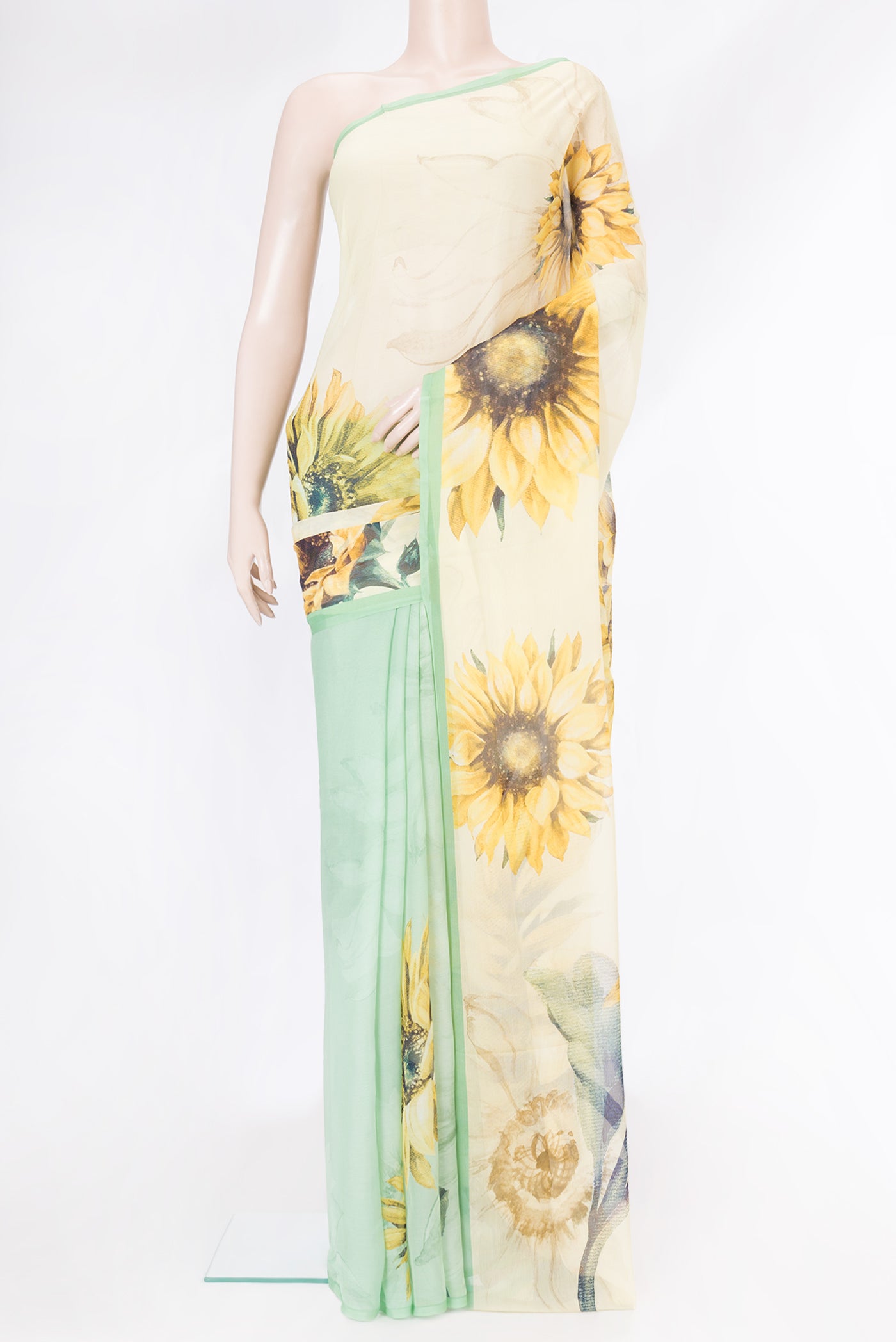 Pista Green Dual Tone Mysore Chiffon Saree with Printed design on the body and Plain Border.  displayed on a mannequin