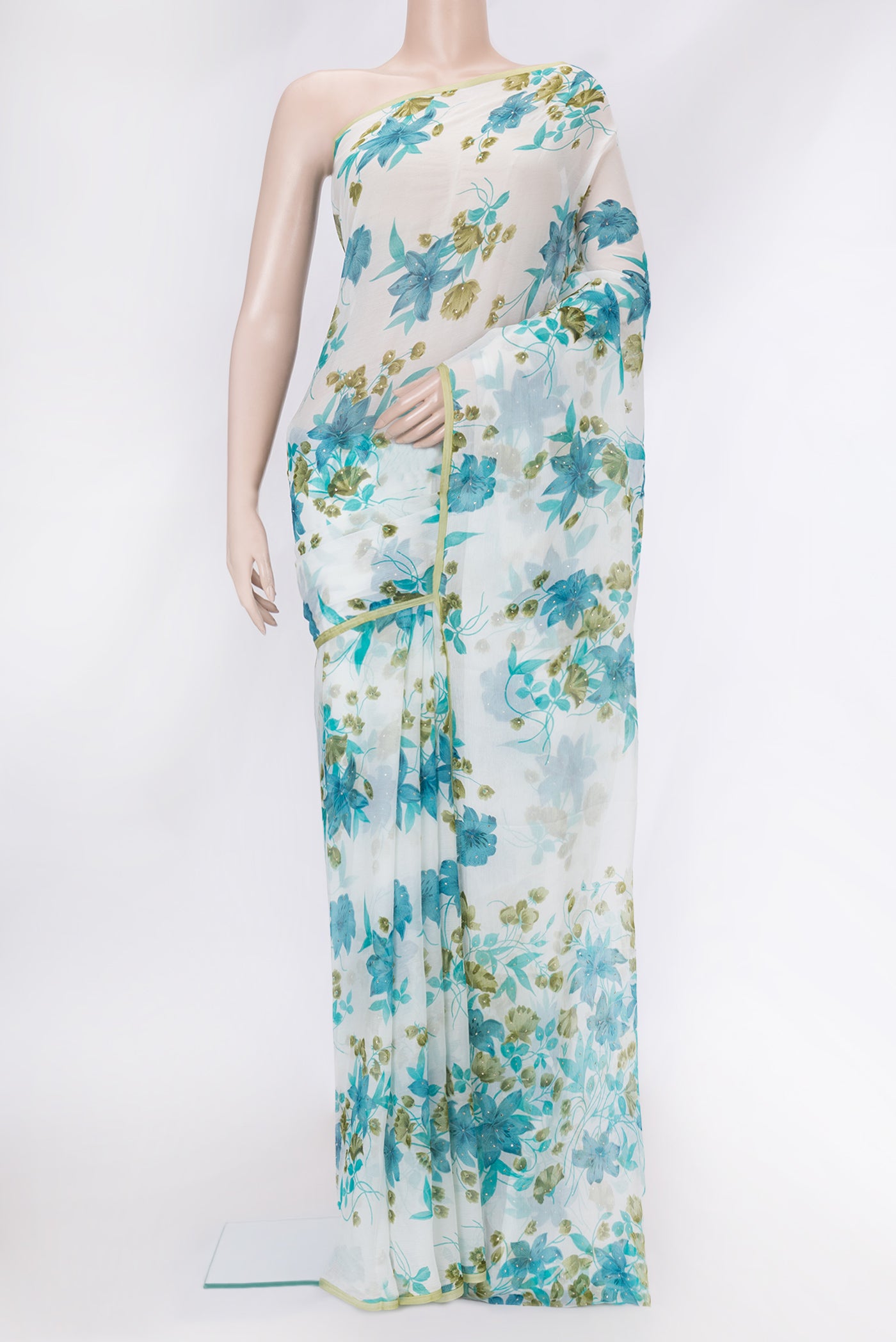 Off White Dual Tone Mysore Chiffon Saree with Printed design on the body and Plain Border.  displayed on a mannequin