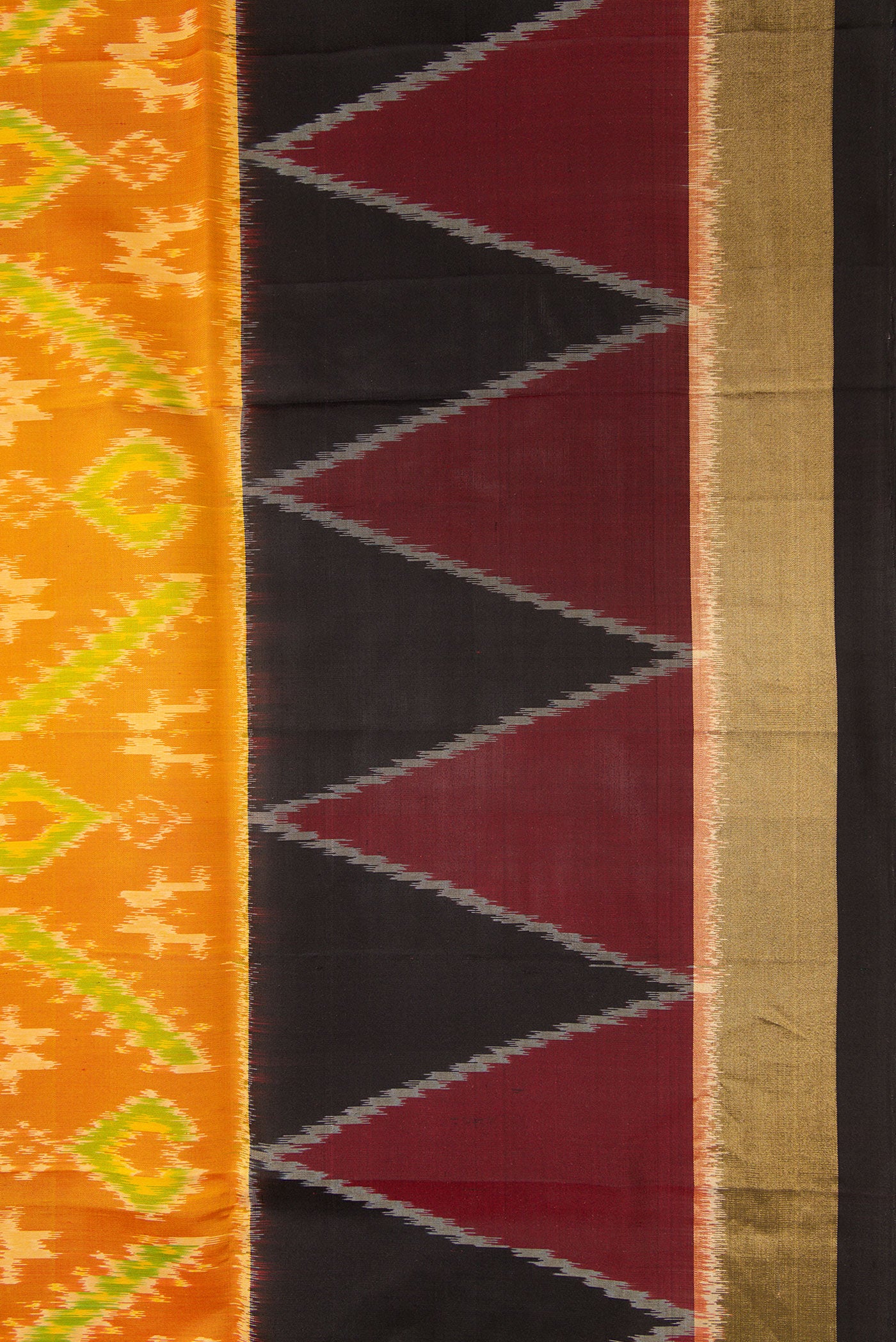 Border image of Mustard Dual Tone Soft Silk Saree with Ikat Print on the body and Ikat Border. 