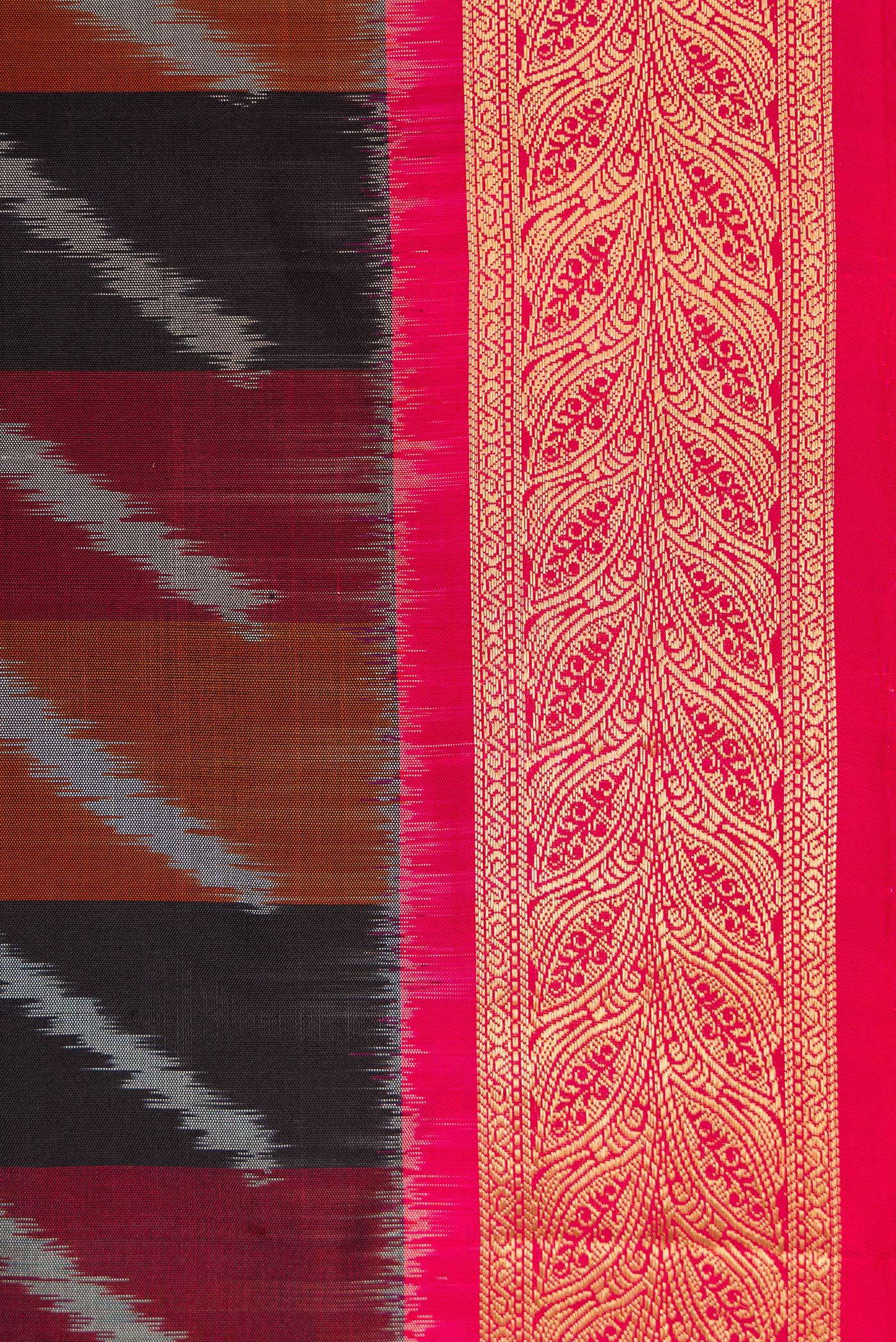 Border image of Black Dual Tone Soft Silk Saree with Stripes on the body and Zari Border. 