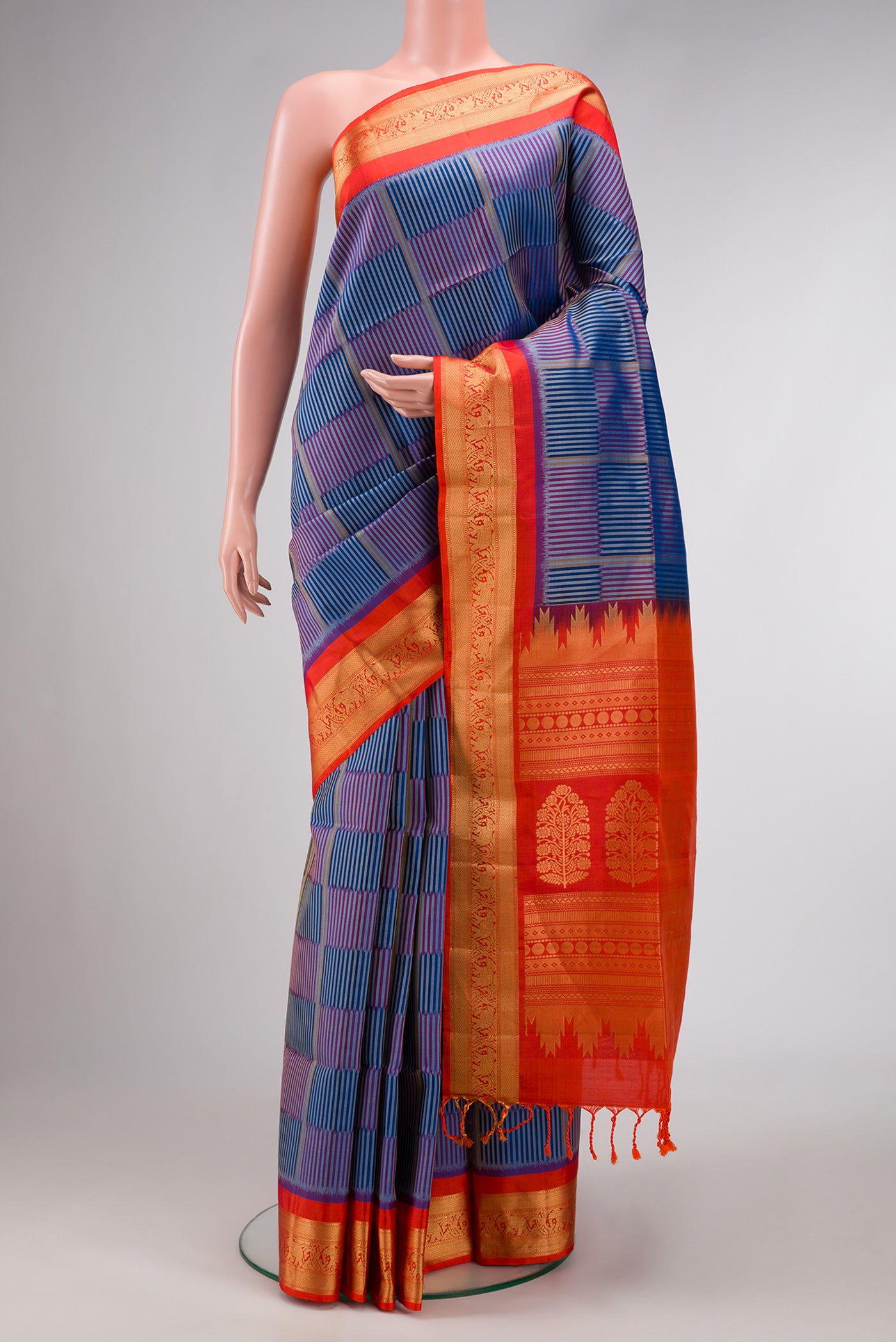 Royal Blue Dual Tone Soft Silk Saree with Checked design on the body and Zari Border.  displayed on a mannequin