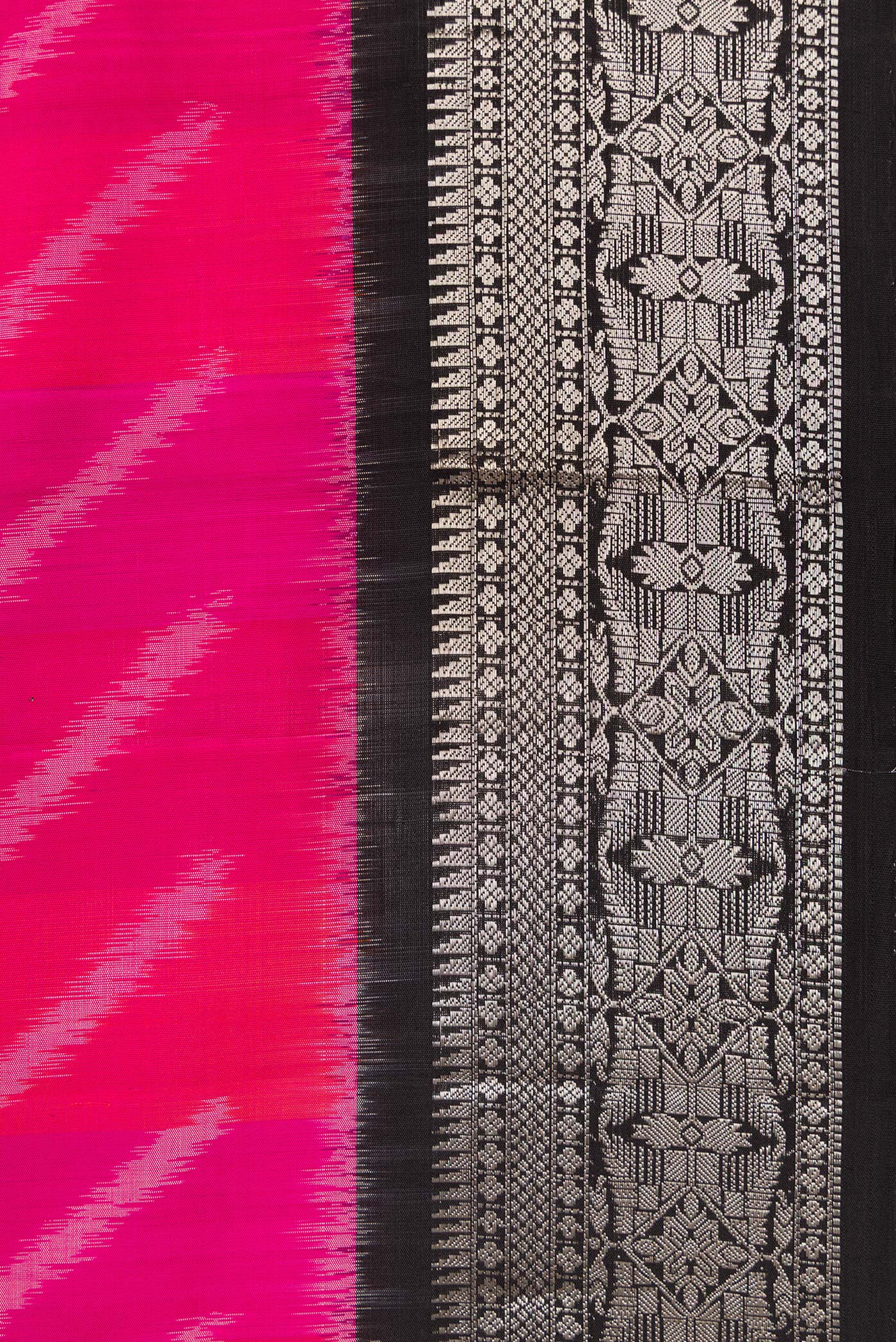Border image of Pink Dual Tone Soft Silk Saree with Ikat Print on the body and Zari Border. 
