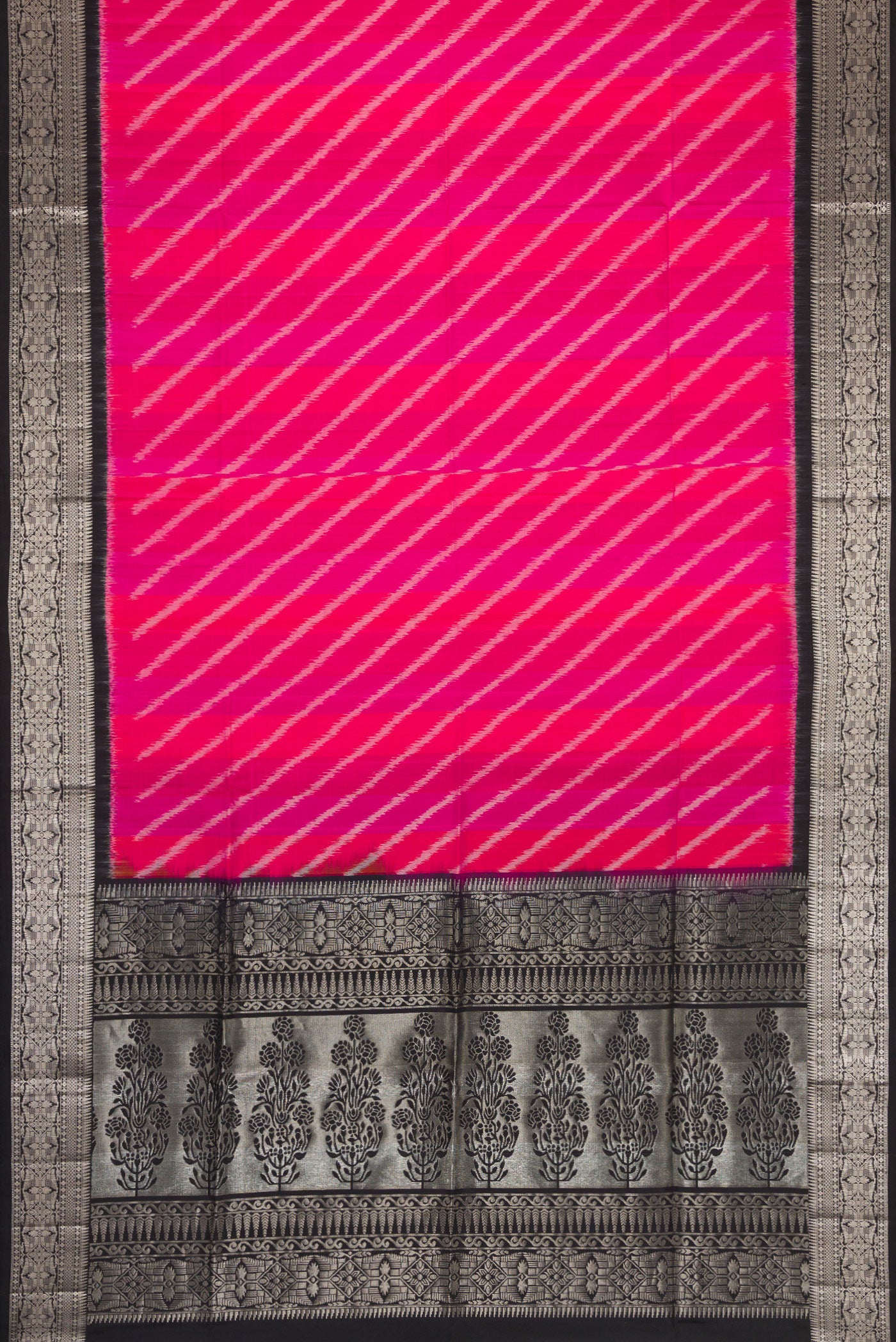 Flat view of Pink Dual Tone Soft Silk Saree with Ikat Print on the body and Zari Border. 