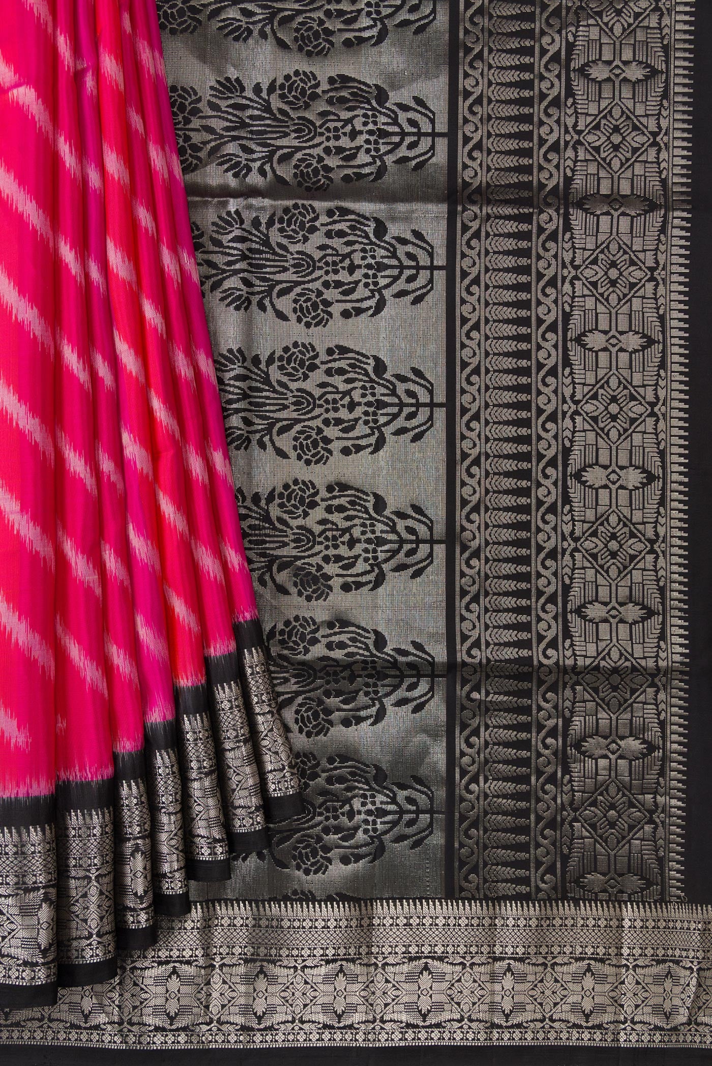 Pleats and pallu of Pink Dual Tone Soft Silk Saree with Ikat Print on the body and Zari Border. 