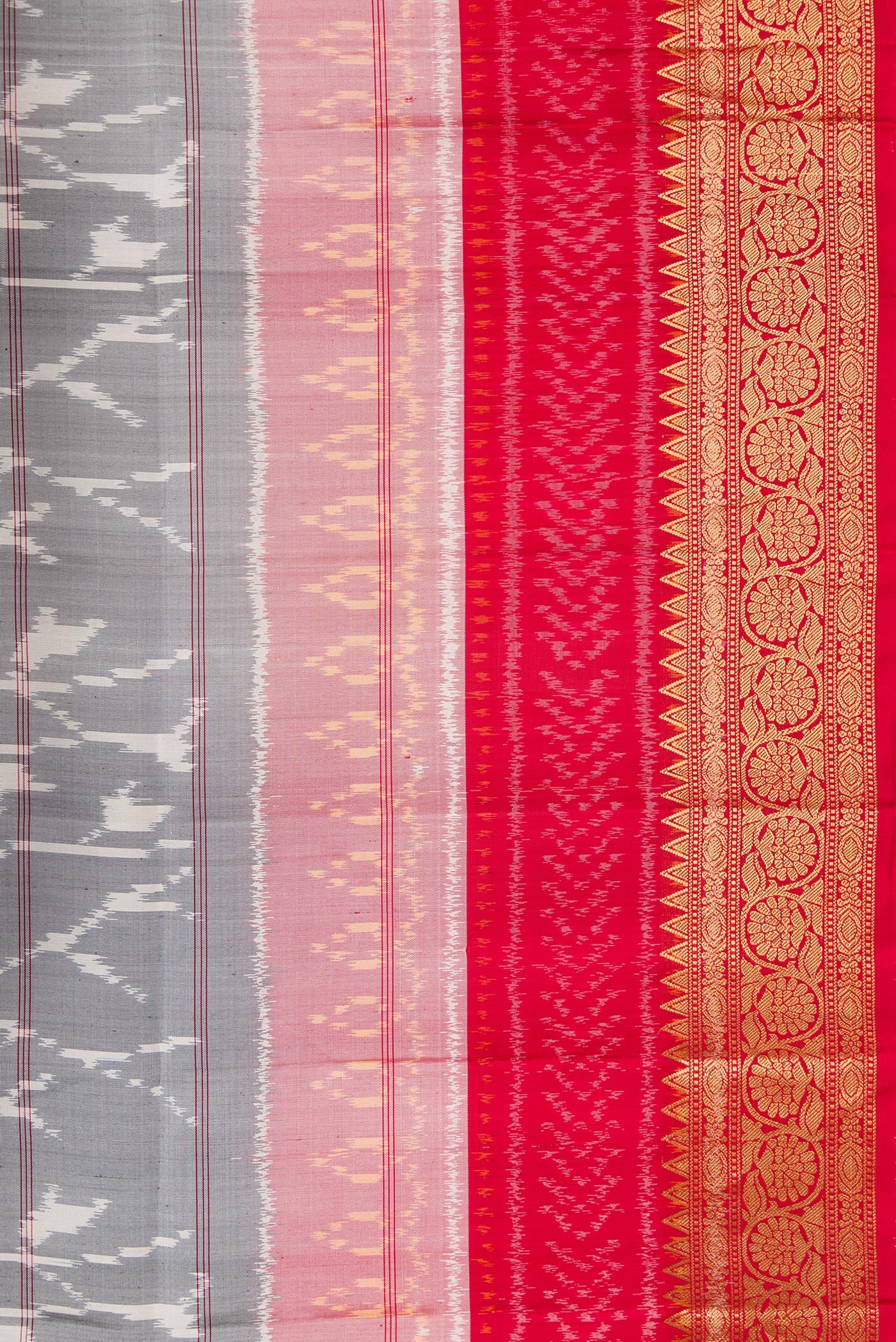 Border image of Grey Dual Tone Soft Silk Saree with Ikat Print on the body and Zari Border. 