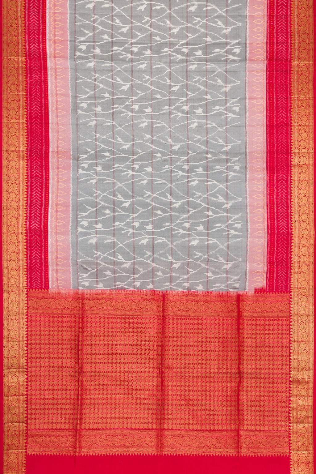Flat view of Grey Dual Tone Soft Silk Saree with Ikat Print on the body and Zari Border. 