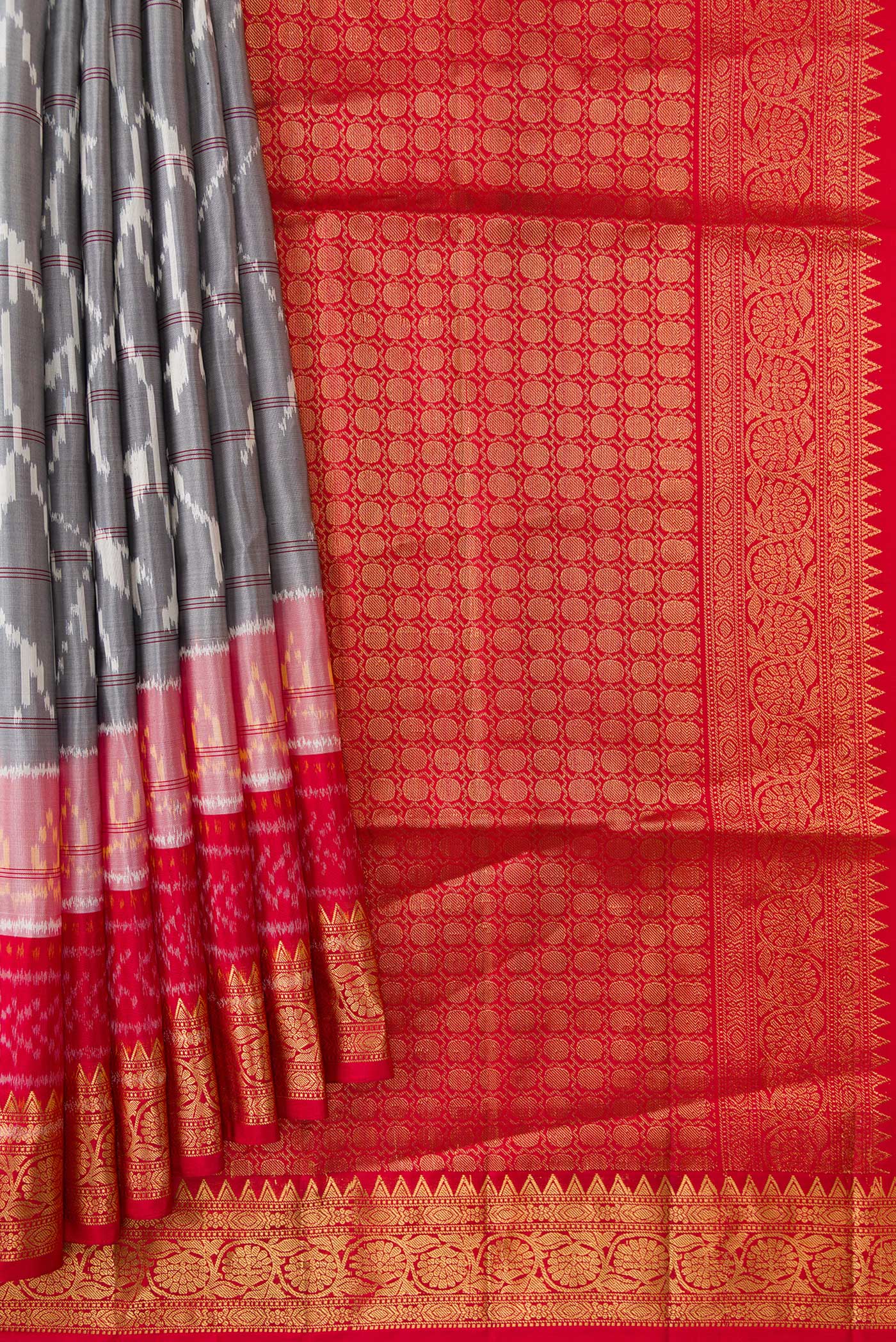 Pleats and pallu of Grey Dual Tone Soft Silk Saree with Ikat Print on the body and Zari Border. 