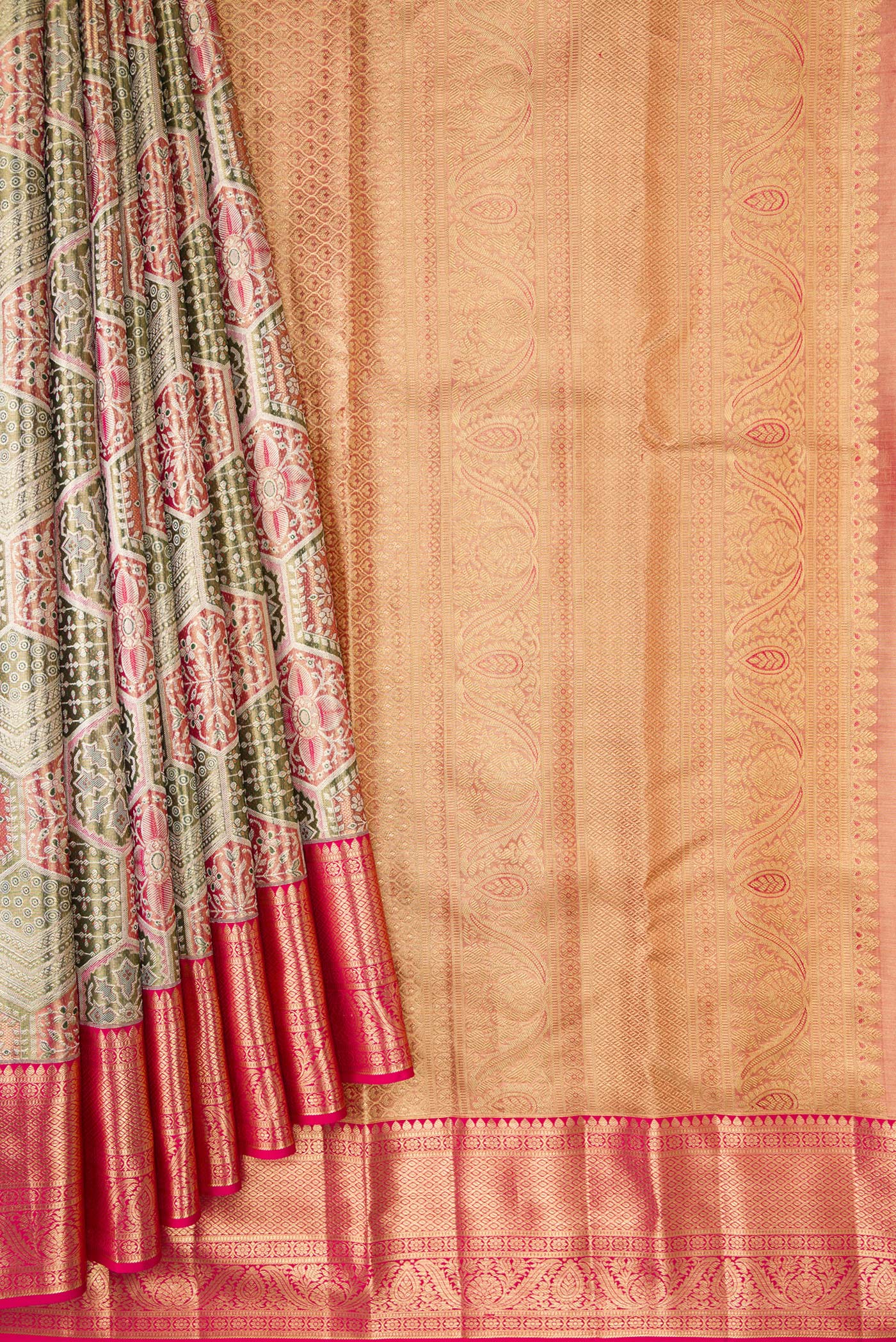 Pleats and pallu of Gold Dual Tone Kanjivaram Tissue Silk Saree with Zari Brocade on the body and Zari Border. 