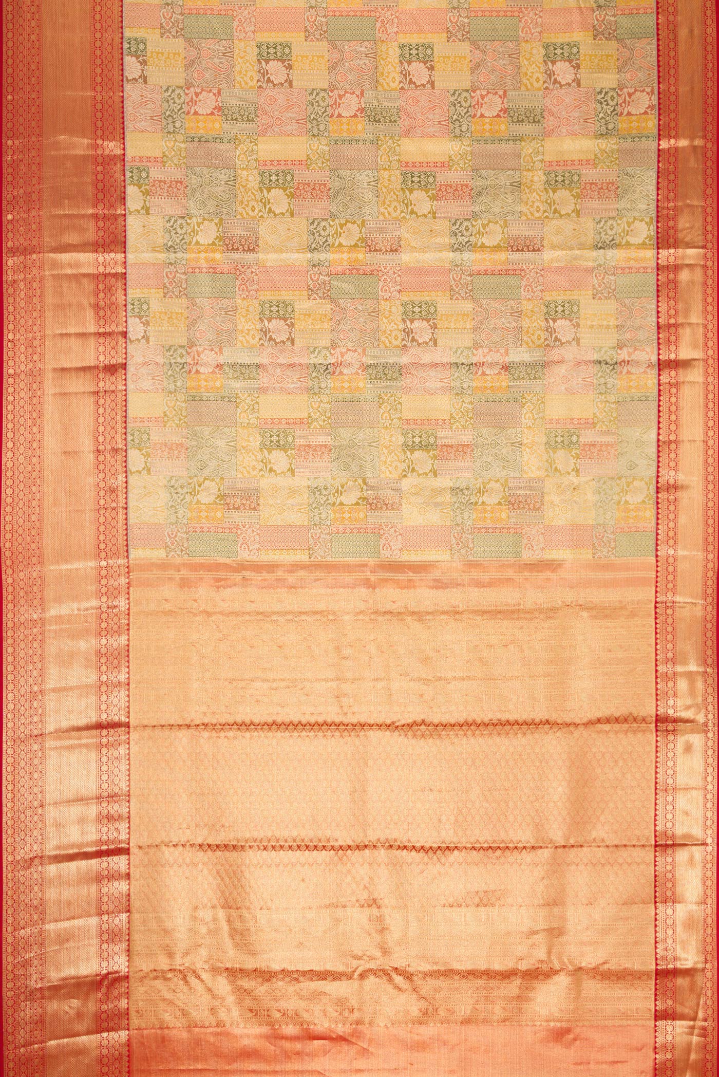 Flat view of Gold Dual Tone Kanjivaram Tissue Silk Saree with Zari Brocade on the body and Zari Border. 