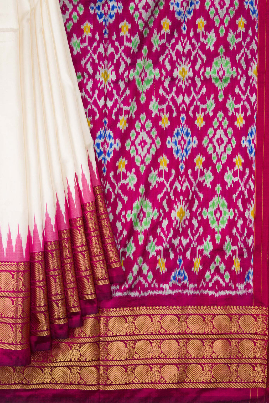 Pleats and pallu of White Dual Tone Double Ikat Saree with Ikat Print on the body and Zari Border. 
