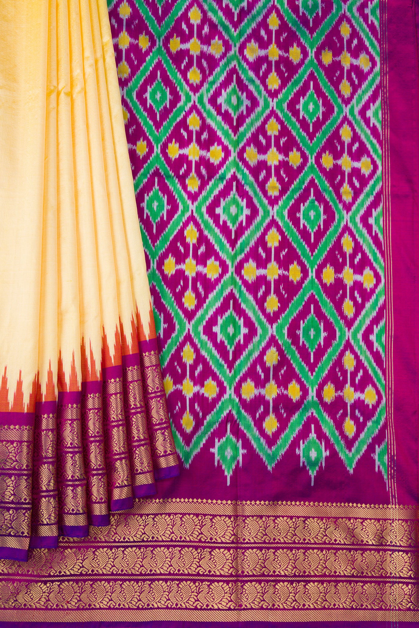 Pleats and pallu of Sandal Dual Tone Double Ikat Saree with Plain Body and Zari Border. 