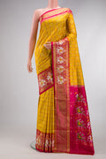 Pink Dual Tone Double Ikat Saree with Ikat Print on the body and Ikat Border.  displayed on a mannequin