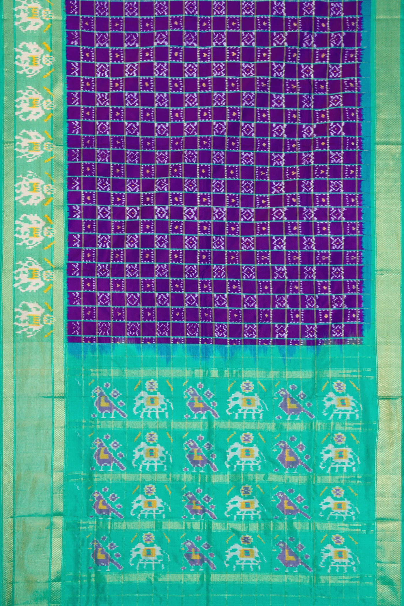 Flat view of Purple Dual Tone Double Ikat Saree with Ikat Print on the body and Ikat Border. 