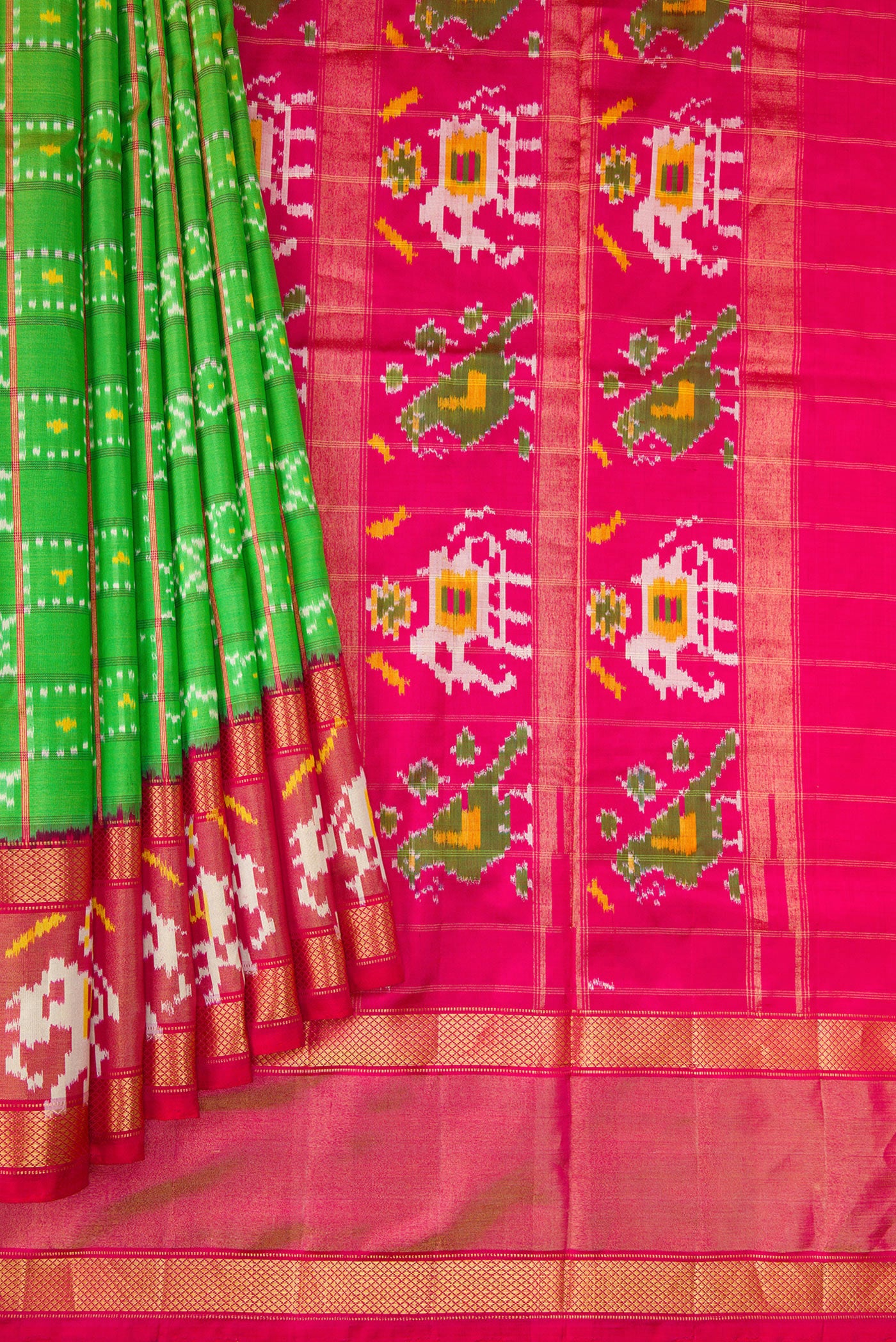 Pleats and pallu of Parrot Green Dual Tone Double Ikat Saree with Ikat Print on the body and Ikat Border. 