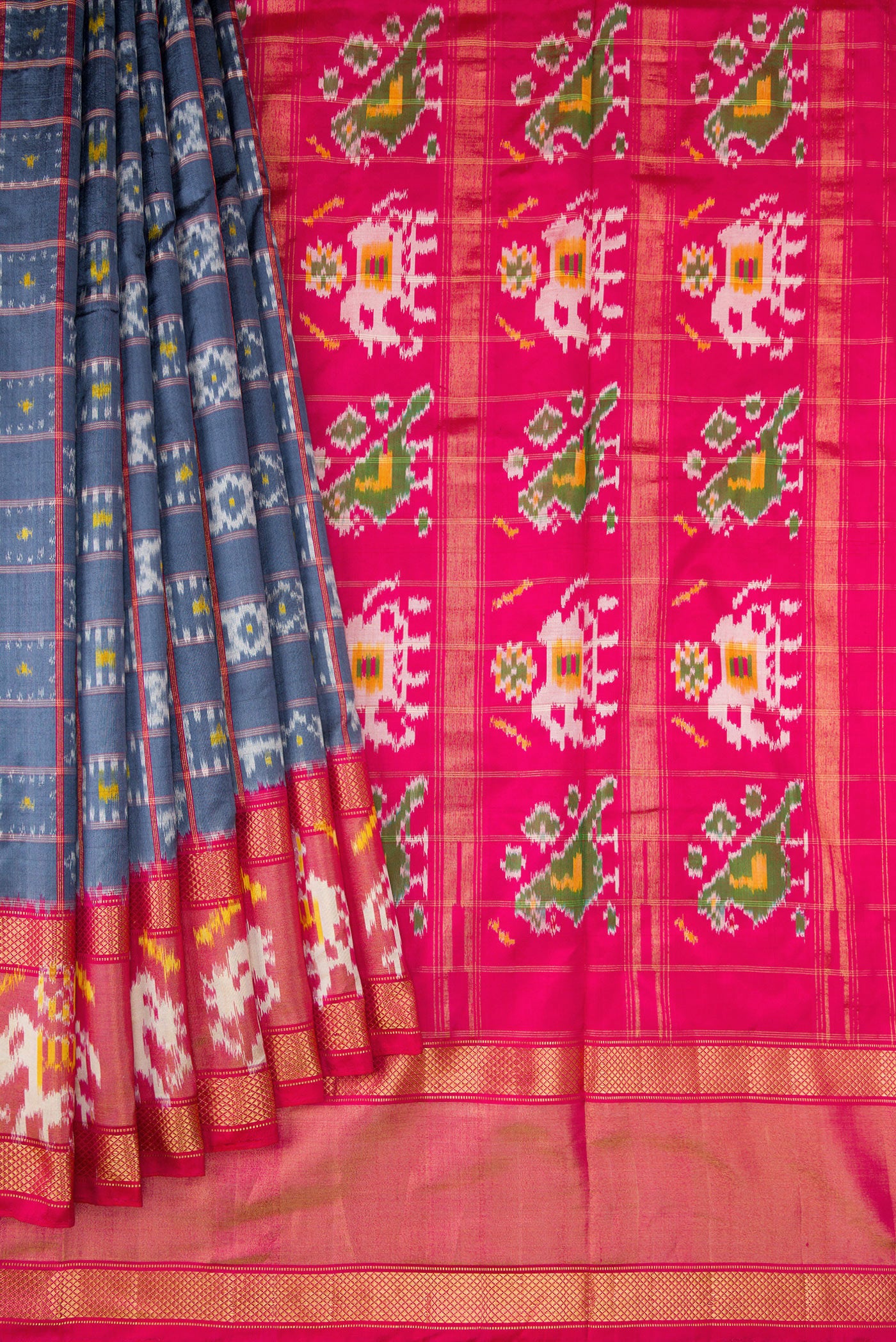 Pleats and pallu of Grey Dual Tone Double Ikat Saree with Ikat Print on the body and Ikat Border. 