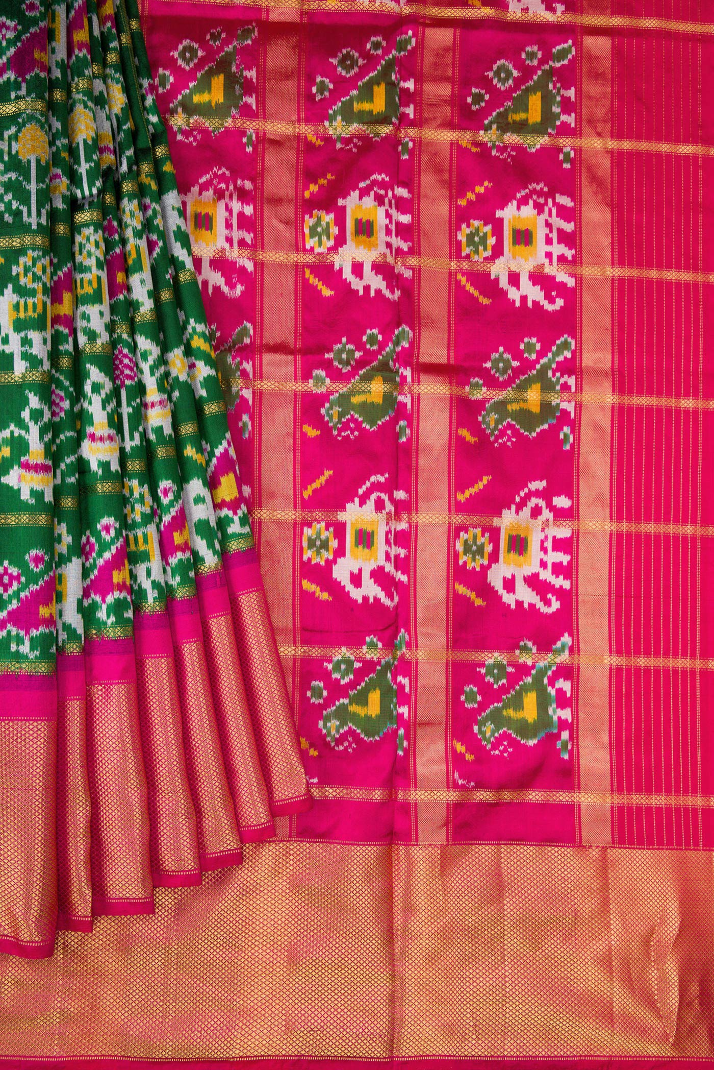 Pleats and pallu of Bottle Green Dual Tone Double Ikat Saree with Ikat Print on the body and Zari Border. 