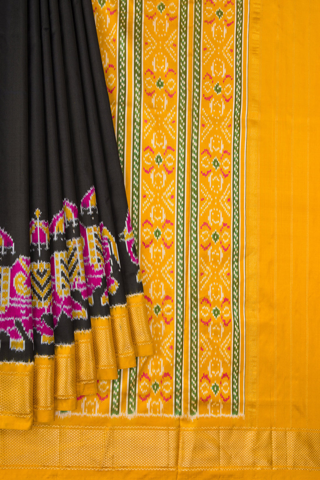 Pleats and pallu of Black Dual Tone Double Ikat Saree with Plain Body and Zari Border. 