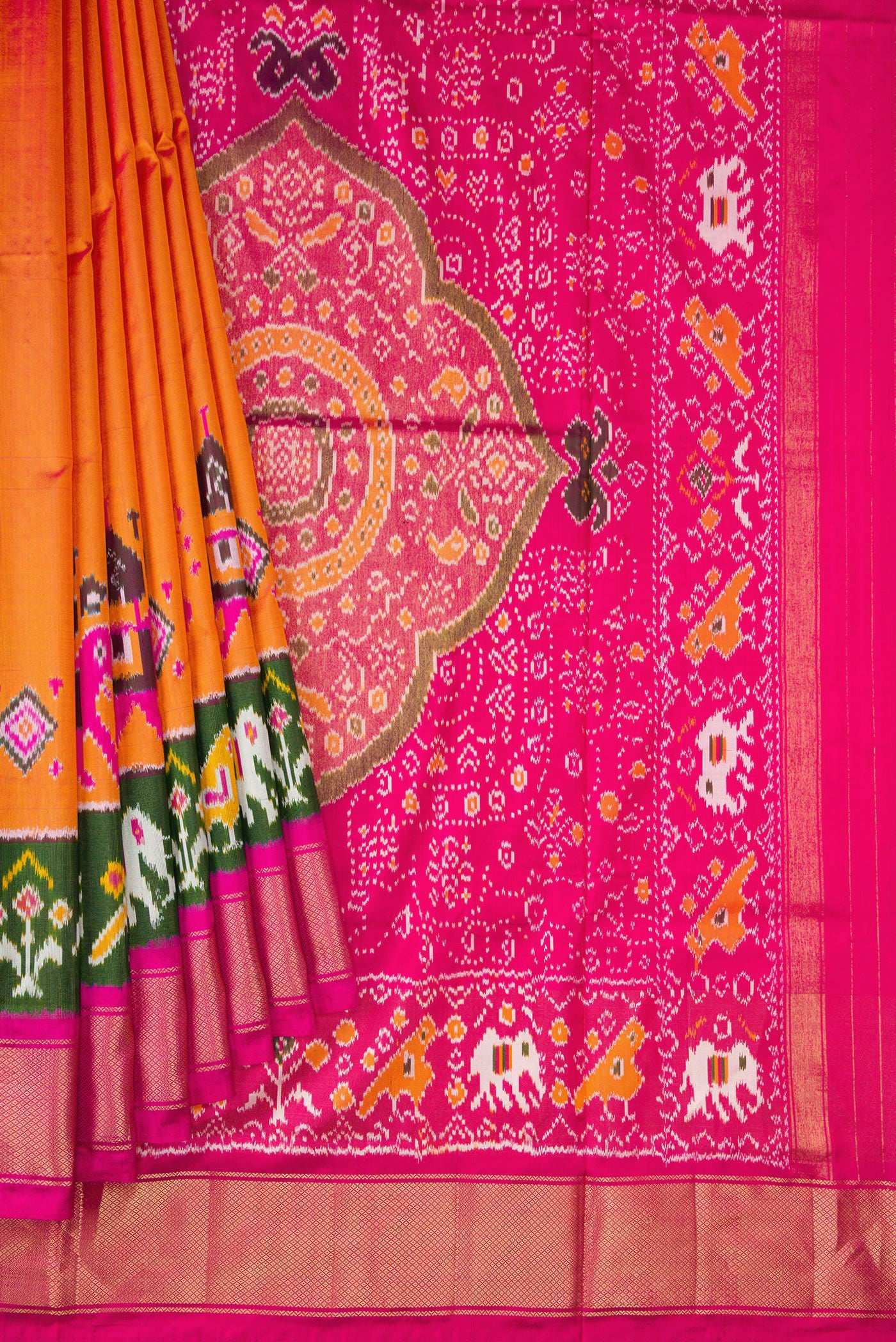 Pleats and pallu of Coral Dual Tone Double Ikat Saree with Ikat Print on the body and Fancy Border. 