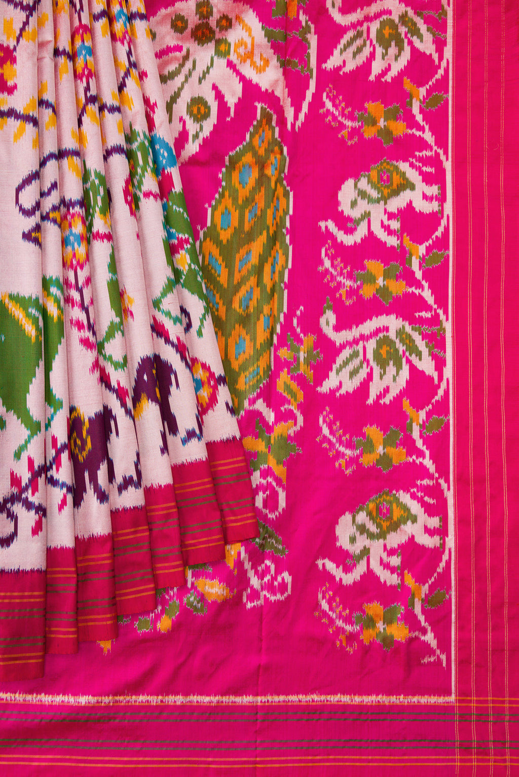 Pleats and pallu of Pink Dual Tone Double Ikat Saree with Ikat Print on the body and Thread Border. 