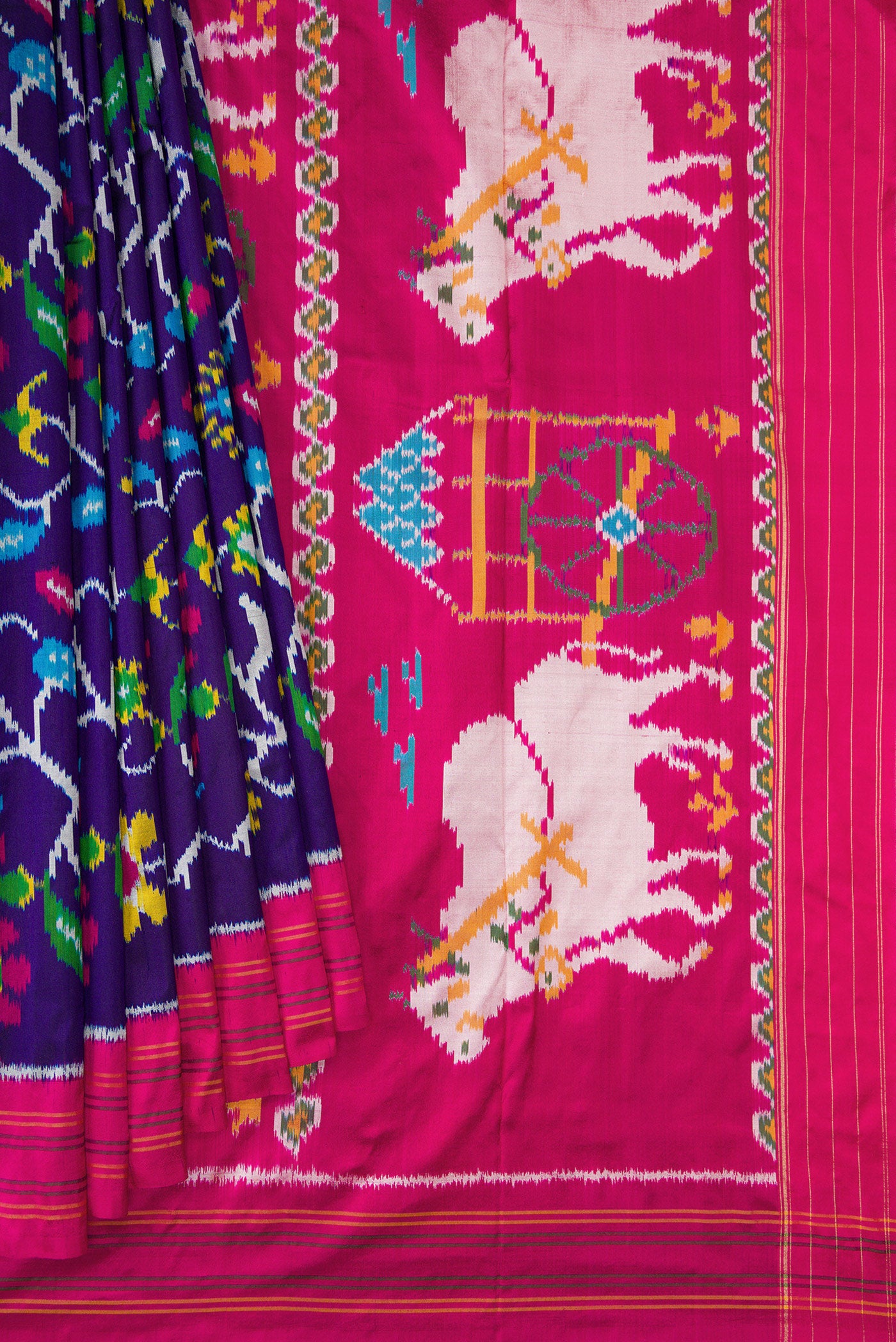 Pleats and pallu of Violet Dual Tone Double Ikat Saree with Ikat Print on the body and Thread Border. 