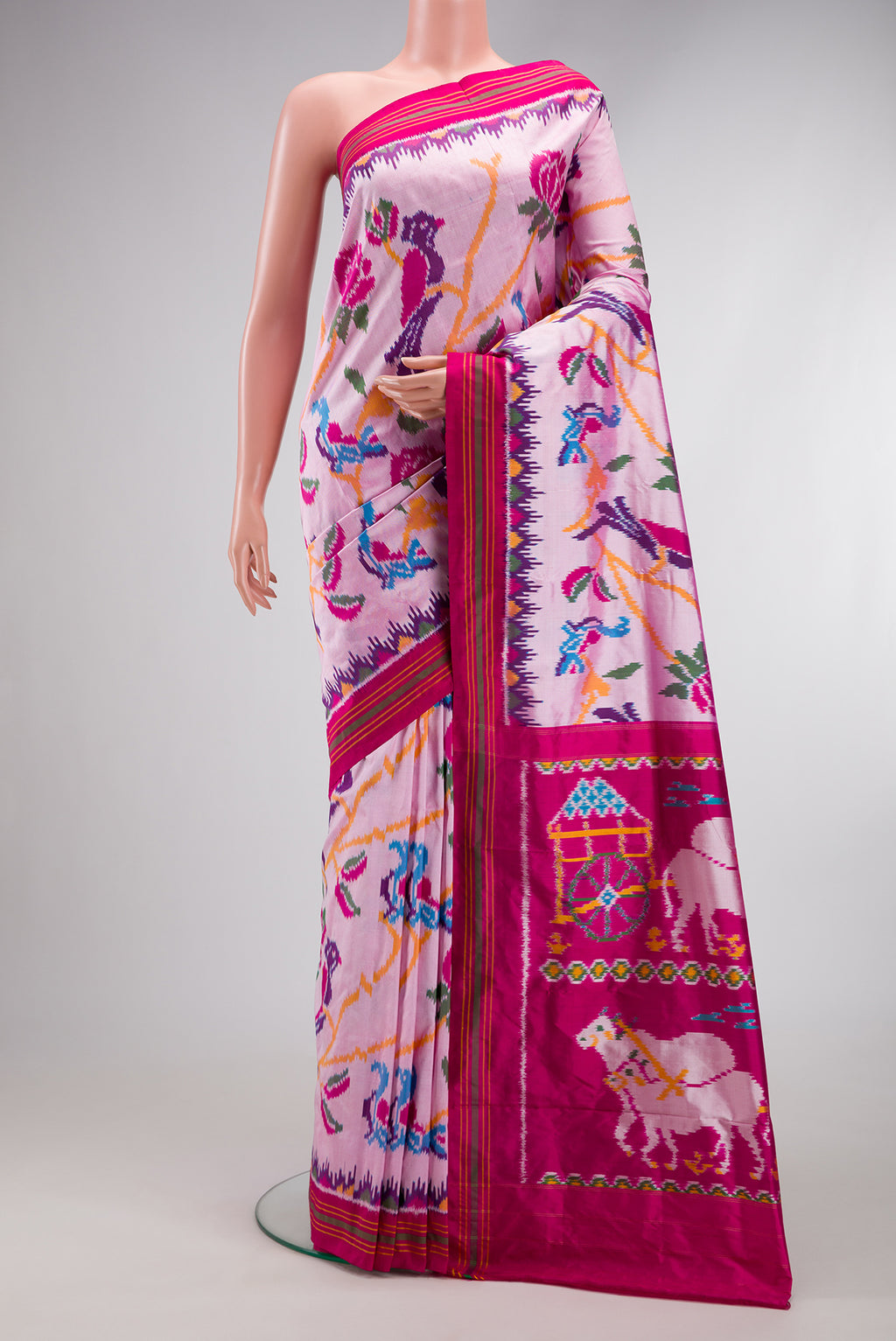 Pink Dual Tone Double Ikat Saree with Ikat Print on the body and Ikat Border.  displayed on a mannequin