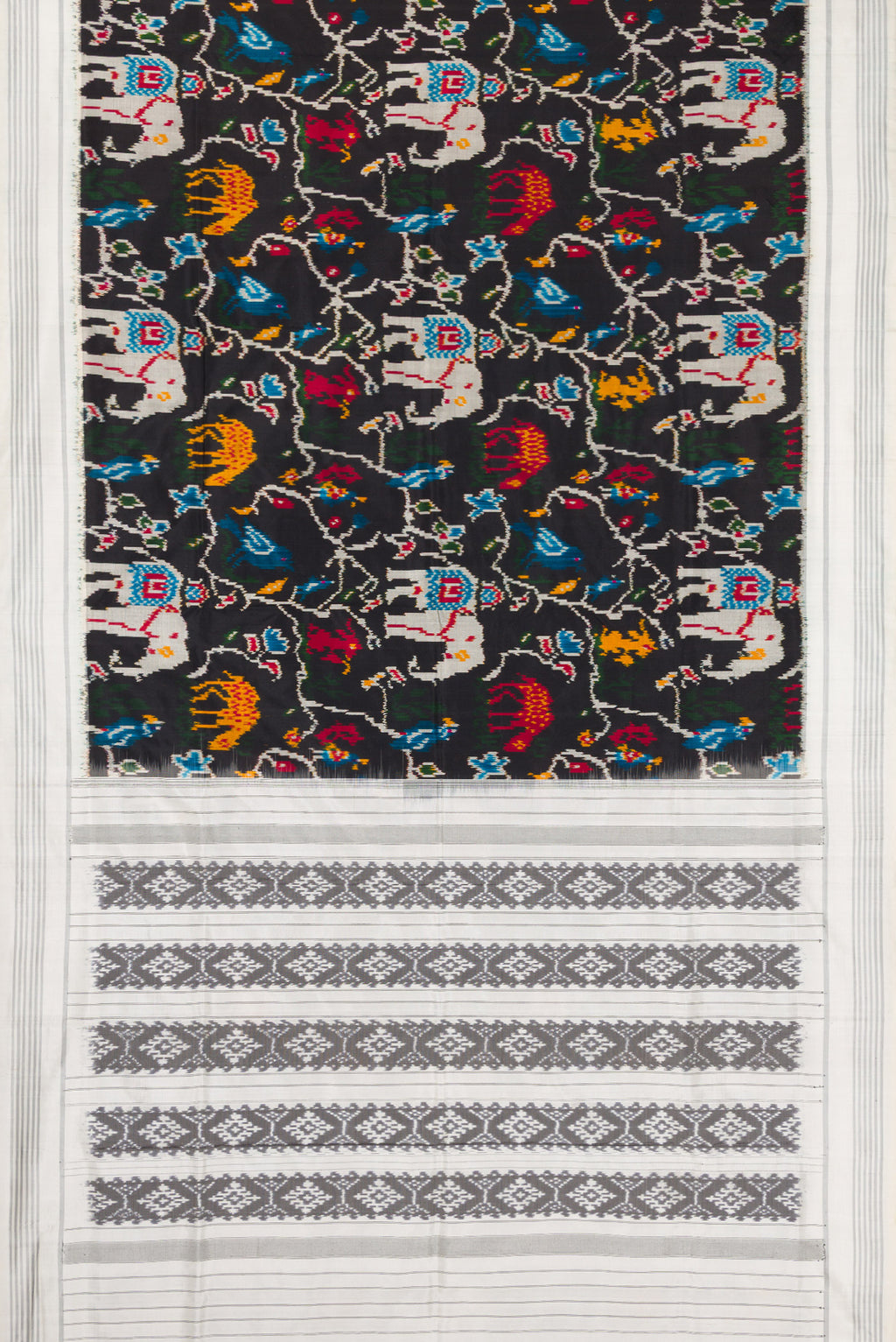 Flat view of Black Dual Tone Double Ikat Saree with Ikat Print on the body and Thread Border. 