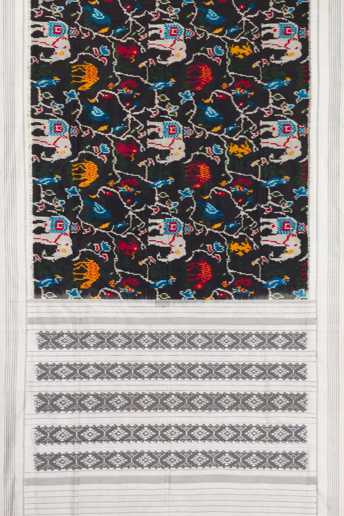 Flat view of Black Dual Tone Double Ikat Saree with Ikat Print on the body and Thread Border. 
