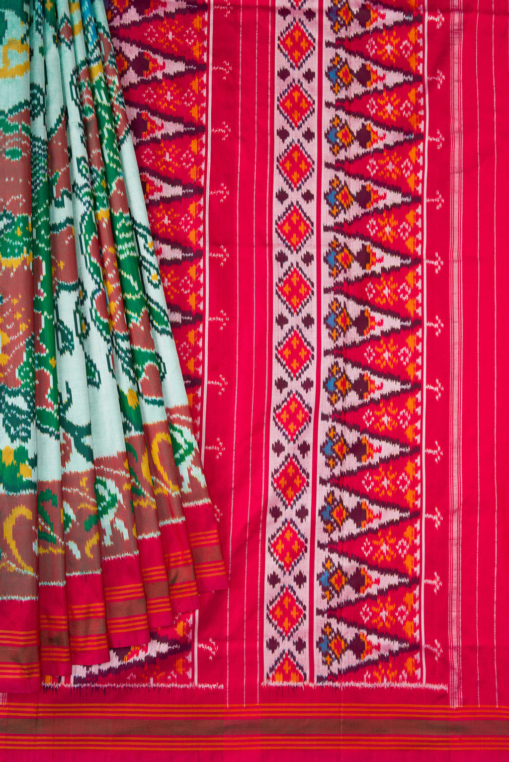 Pleats and pallu of Pista Green Dual Tone Double Ikat Saree with Ikat Print on the body and Ikat Border. 