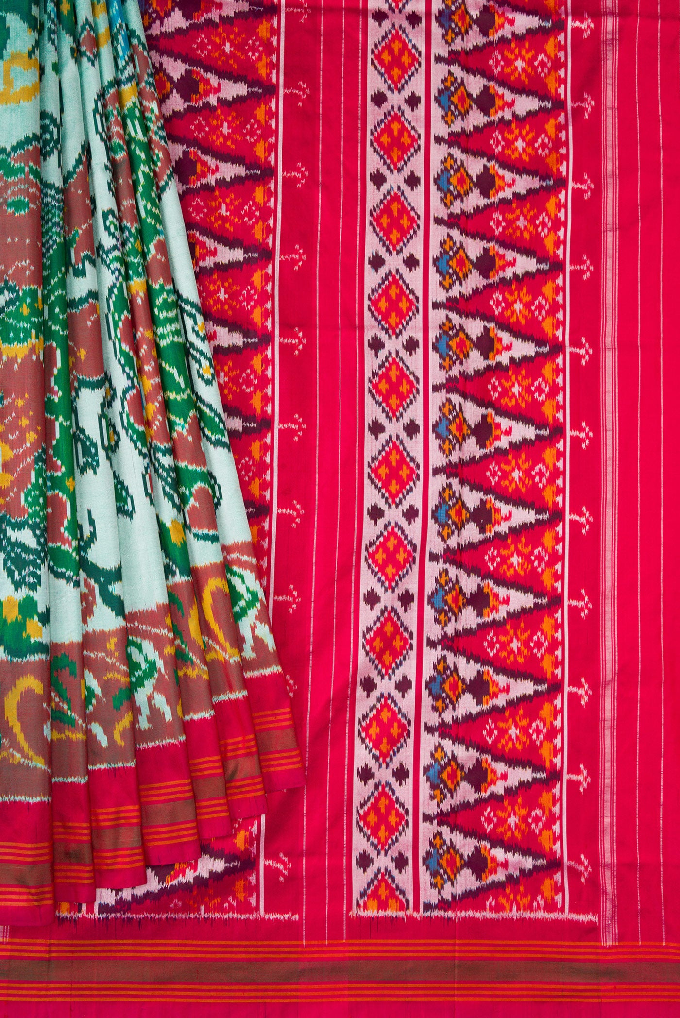 Pleats and pallu of Pista Green Dual Tone Double Ikat Saree with Ikat Print on the body and Ikat Border. 