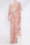 Golden Peach Organza Silk Saree with Printed design on the body and Zari Border.  displayed on a mannequin
