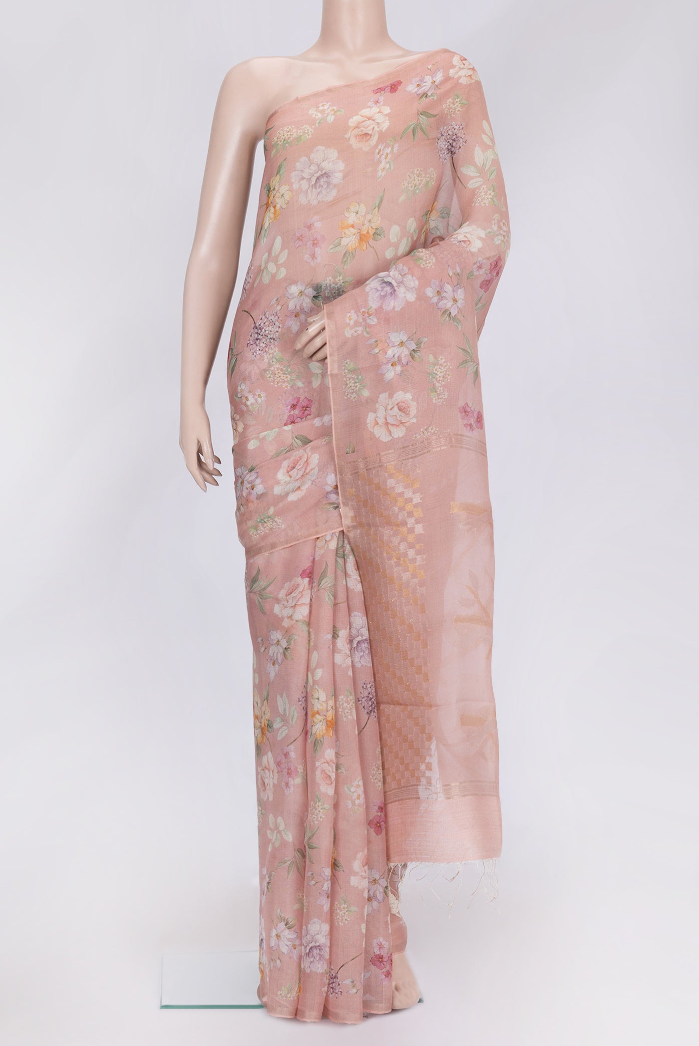 Rose Gold Dual Tone Tussar Silk Saree with Printed design on the body and Zari Border.  displayed on a mannequin