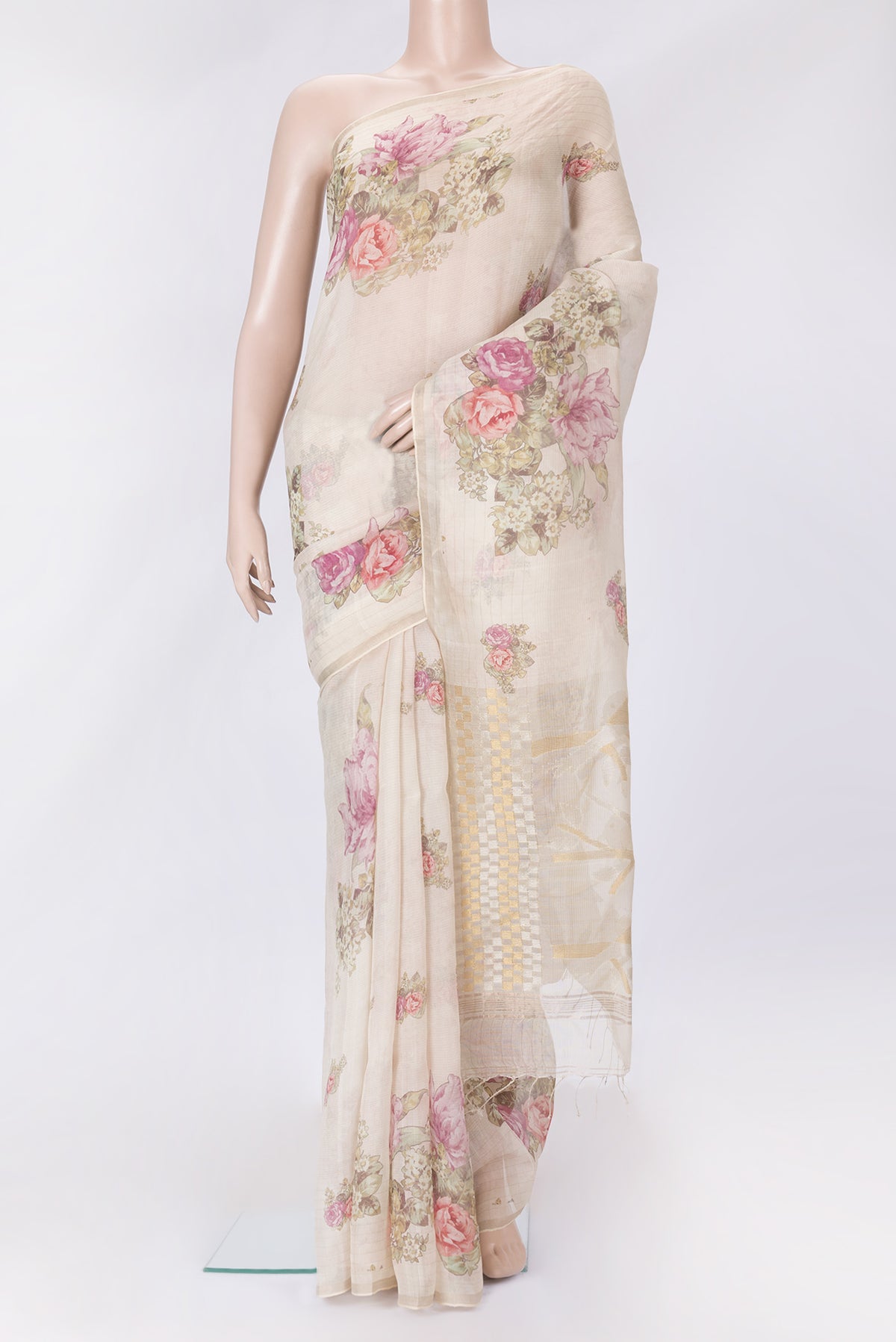 Beige Dual Tone Tussar Silk Saree with Printed design on the body and Zari Border.  displayed on a mannequin