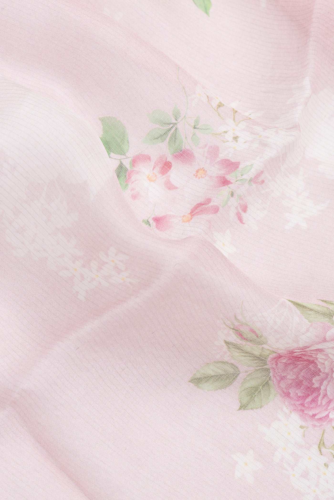 Close up of Pink Dual Tone Tussar Silk Saree with Printed design on the body and Zari Border.  displaying folds