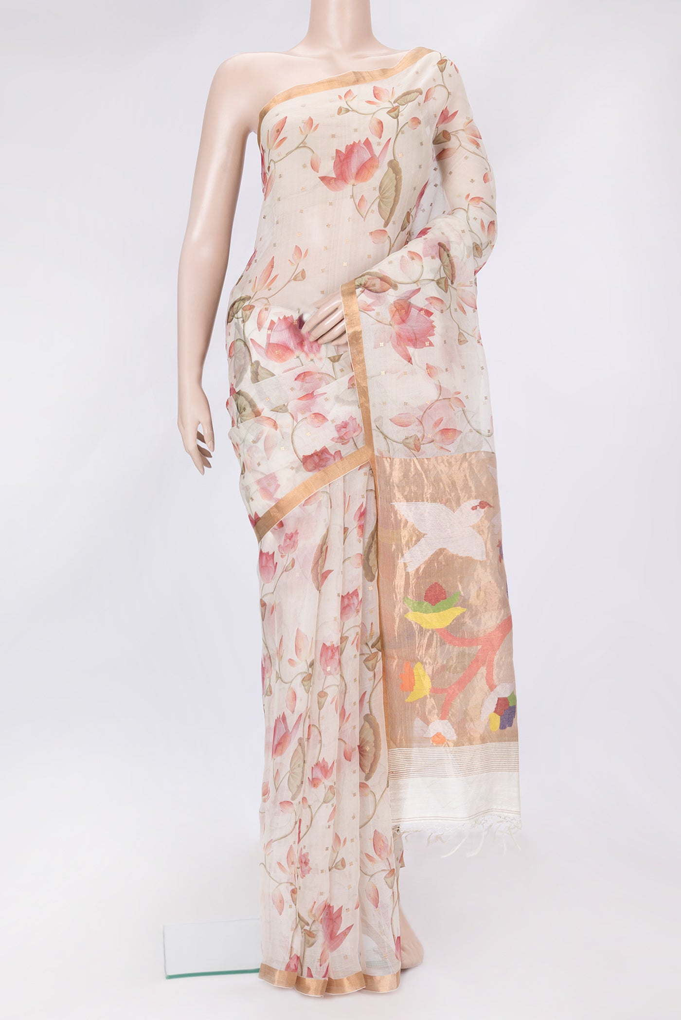 Beige Dual Tone Organza Silk Saree with Printed design on the body and Zari Border.  displayed on a mannequin