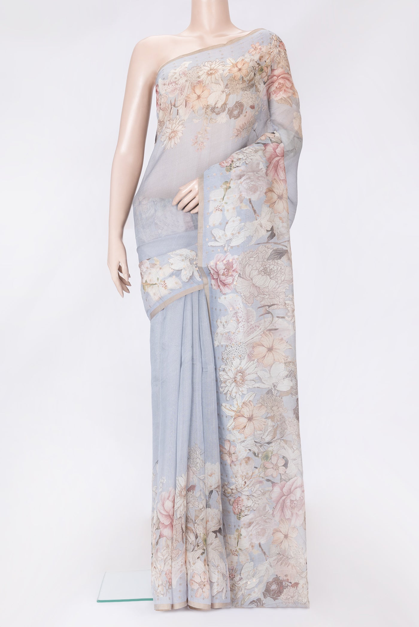 Grey Dual Tone Tussar Silk Saree with Printed design on the body and Embroidery Border.  displayed on a mannequin