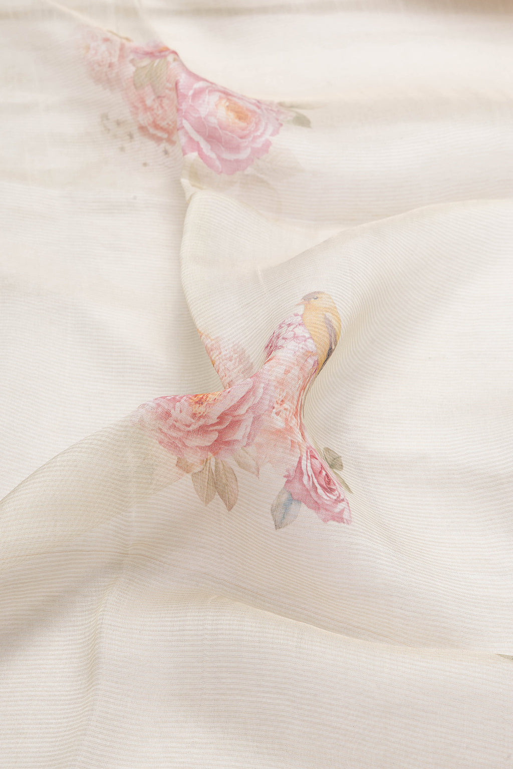 Close up of Sandal Dual Tone Tussar Silk Saree with Printed design on the body and Zari Border.  displaying folds