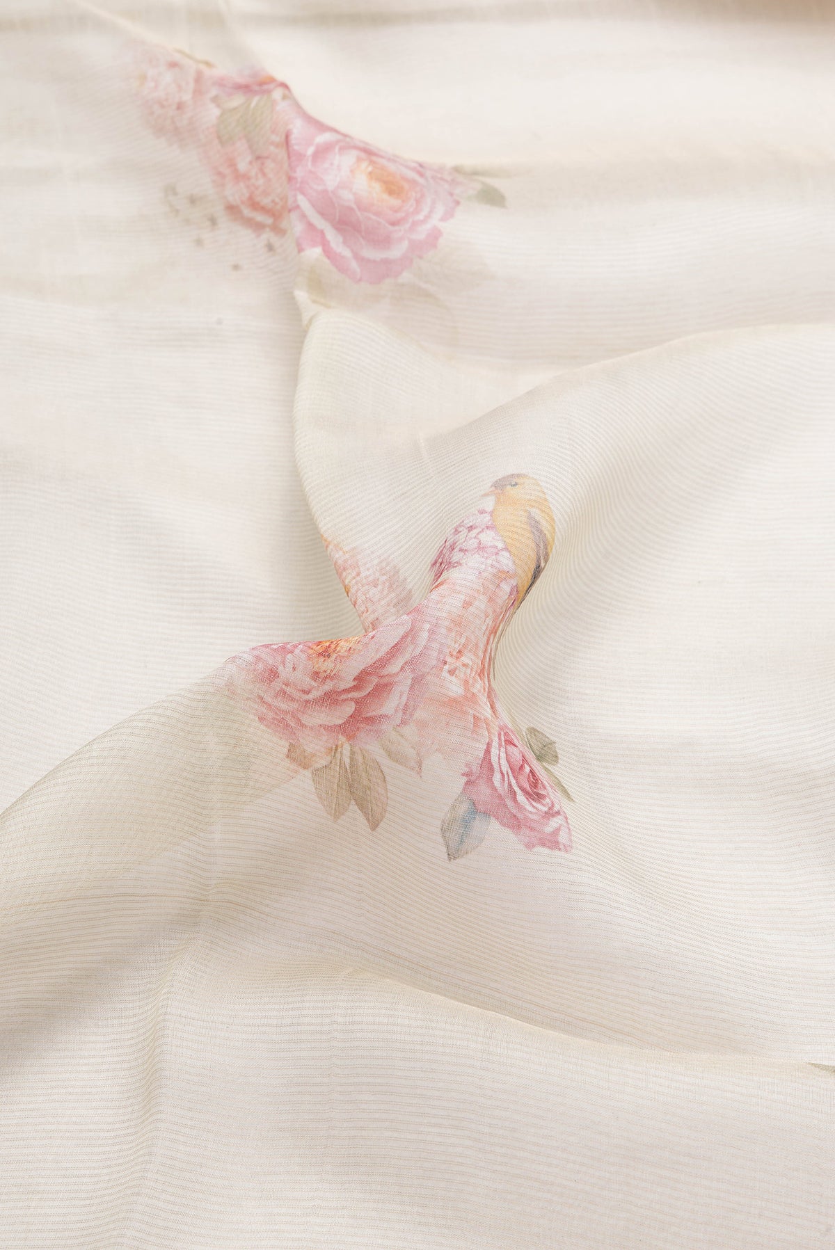 Close up of Sandal Dual Tone Tussar Silk Saree with Printed design on the body and Zari Border.  displaying folds